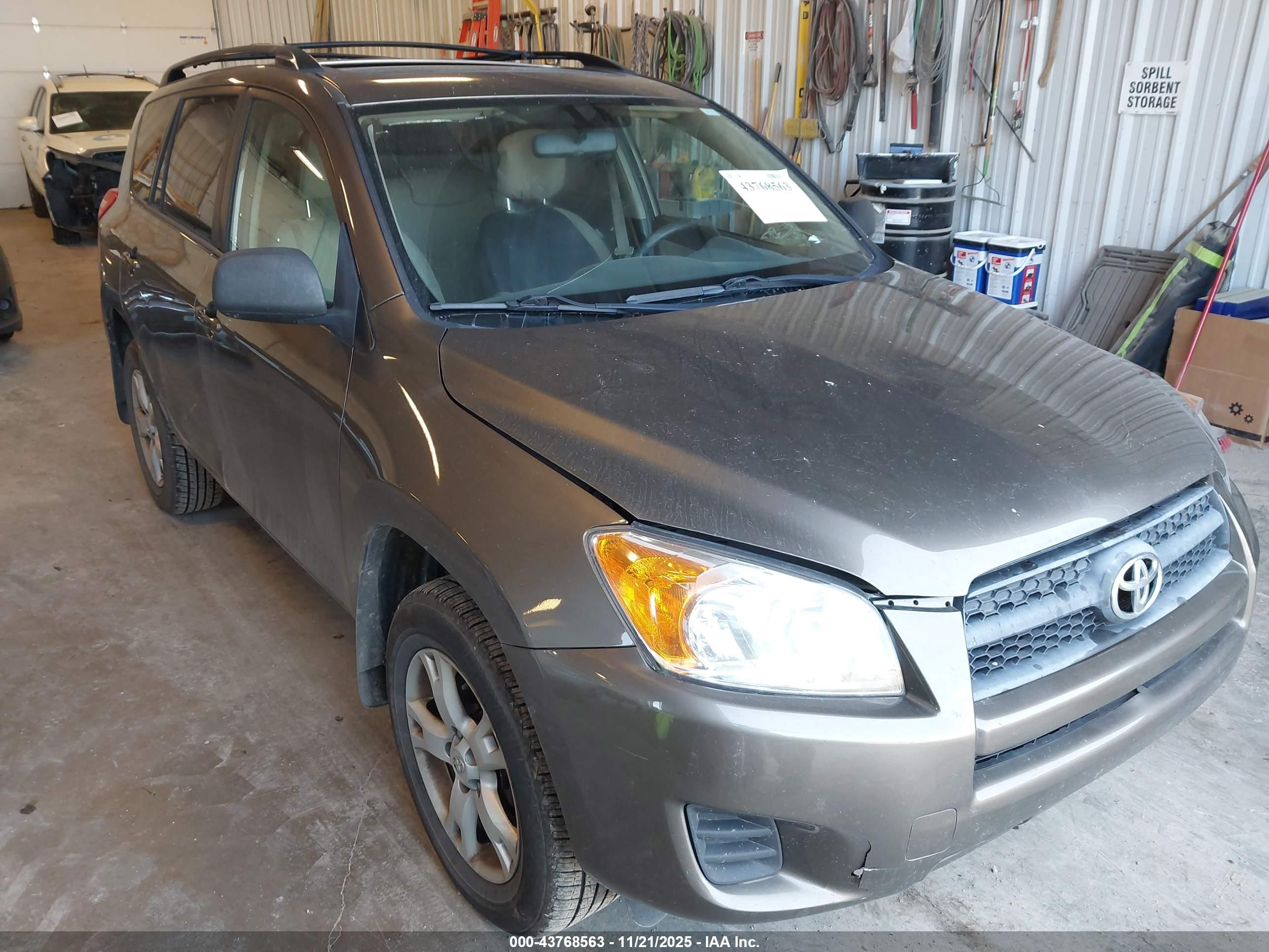 2011 Toyota RAV4, VIN JTMZF4DV1B5035977 — Side