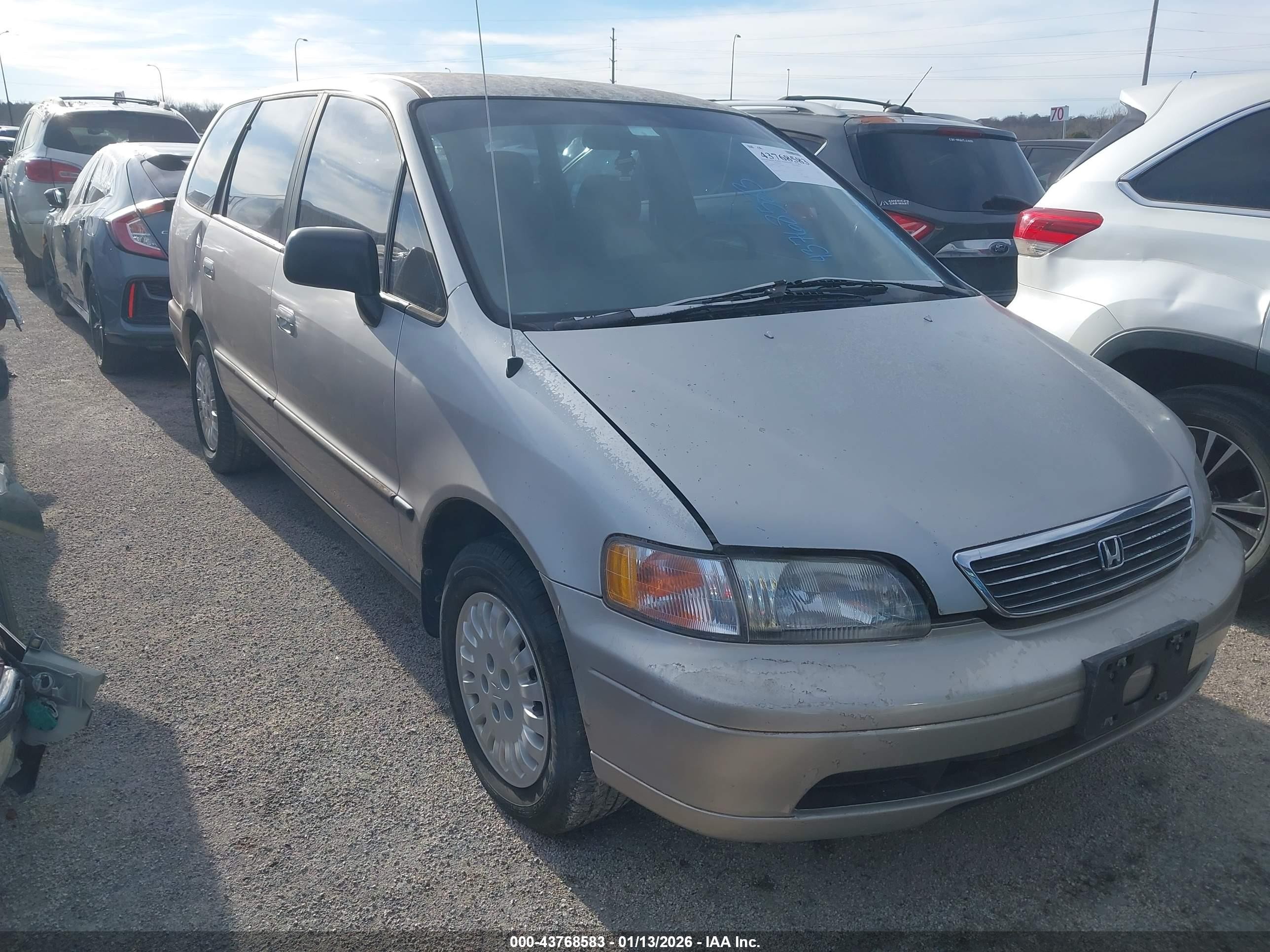 1997 Honda Odyssey LX, VIN JHMRA1843VC020684 — Side