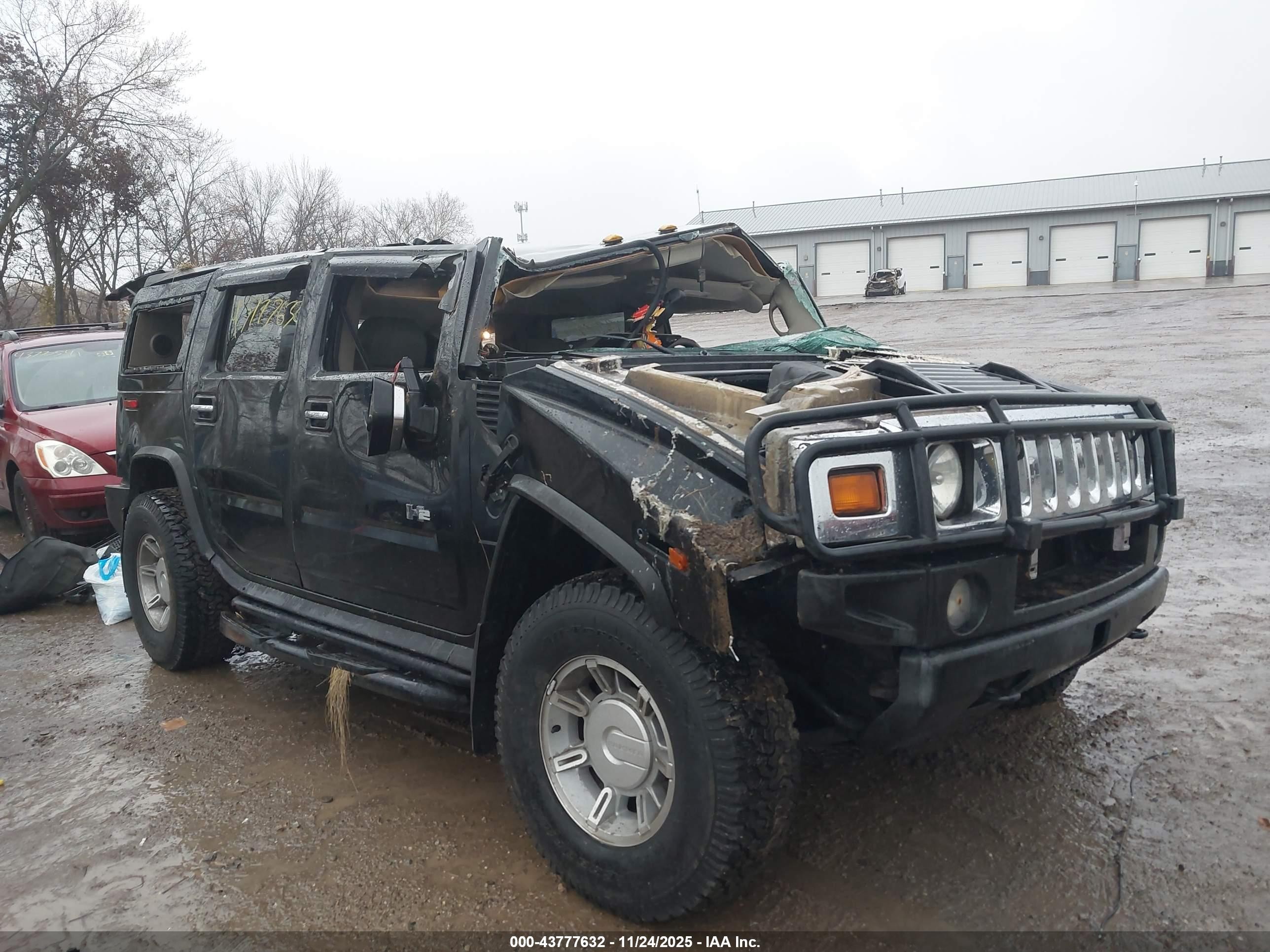 2003 Hummer H2, VIN 5GRGN23U33H129557 — Rollover