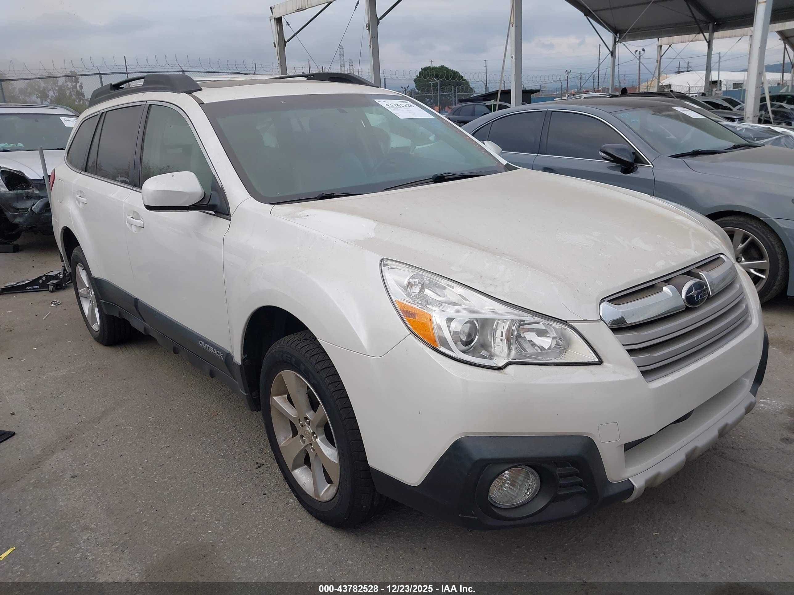 2014 Subaru Outback Limited, VIN 4S4BRBLC6E3273378 — Storm