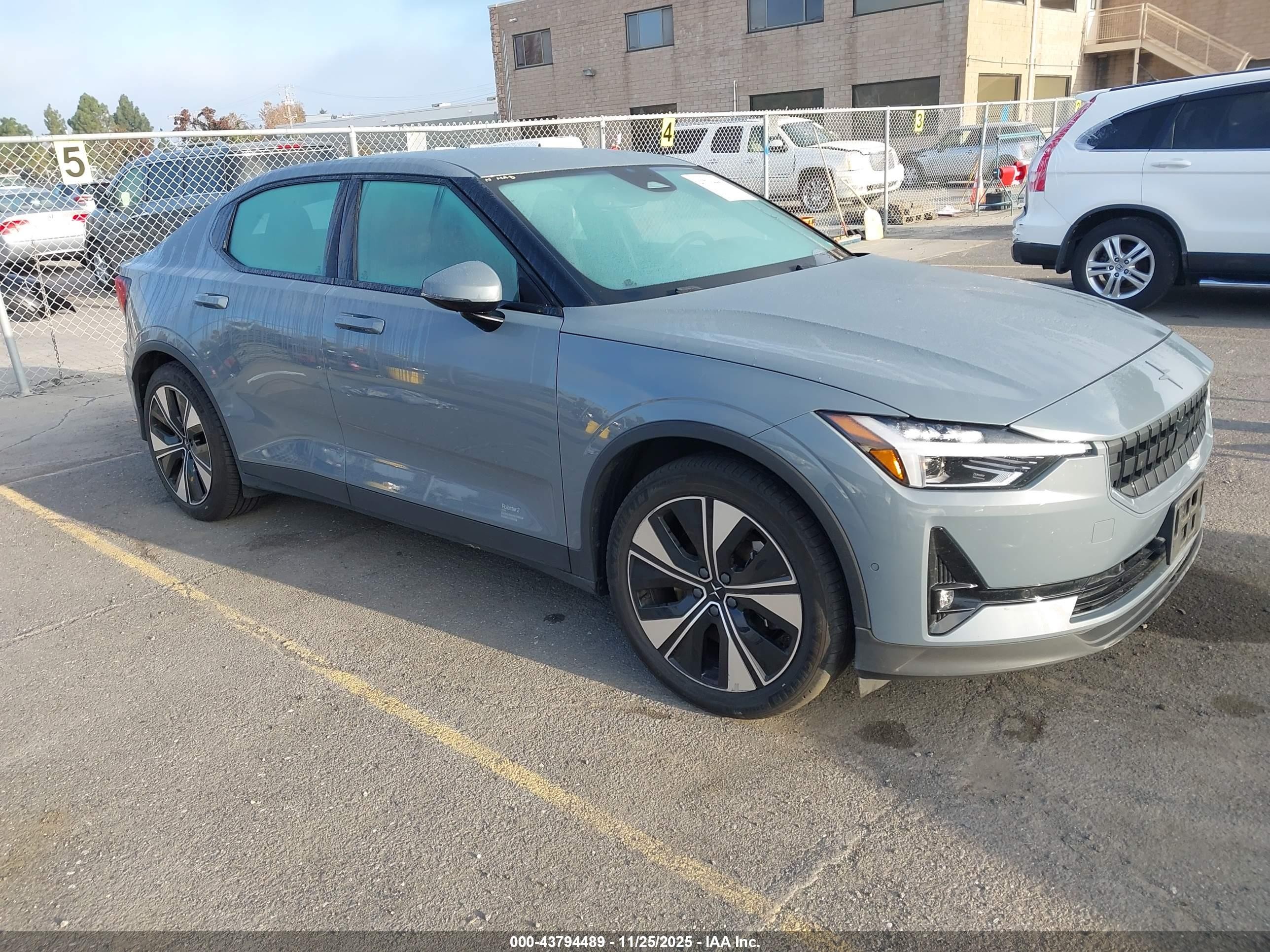 2023 Polestar 2, VIN YSMEG3KA0PL120080 — Бок