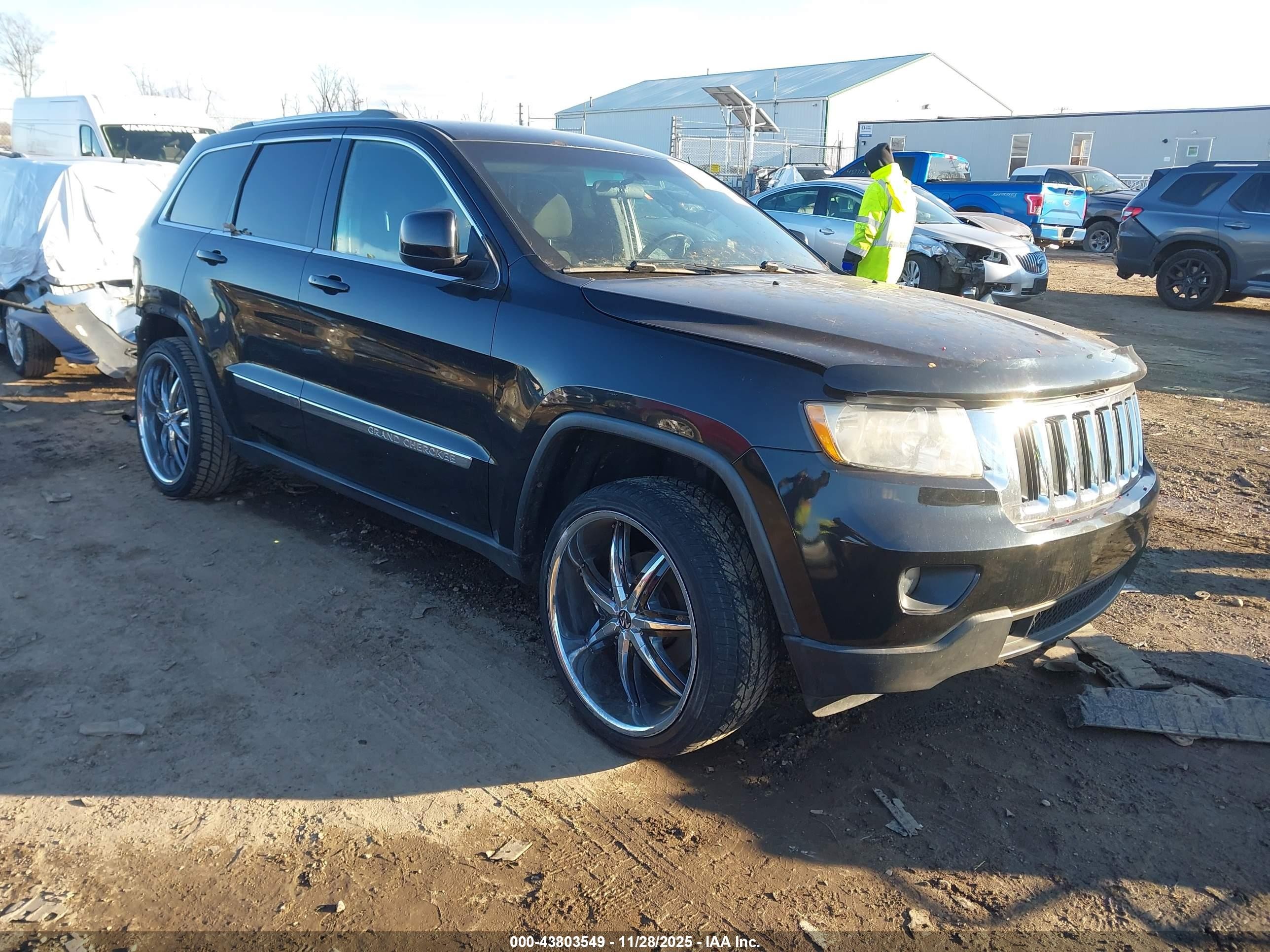 2012 Jeep Grand Cherokee Laredo, VIN 1C4RJFAG0CC114473 — Зад