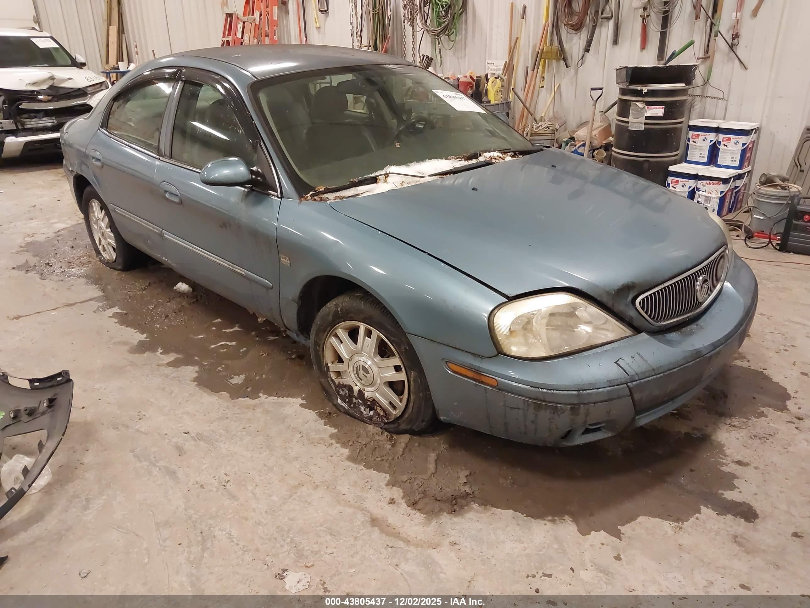 2005 Mercury Sable LS, VIN 1MEHM55S45A617612 — Side