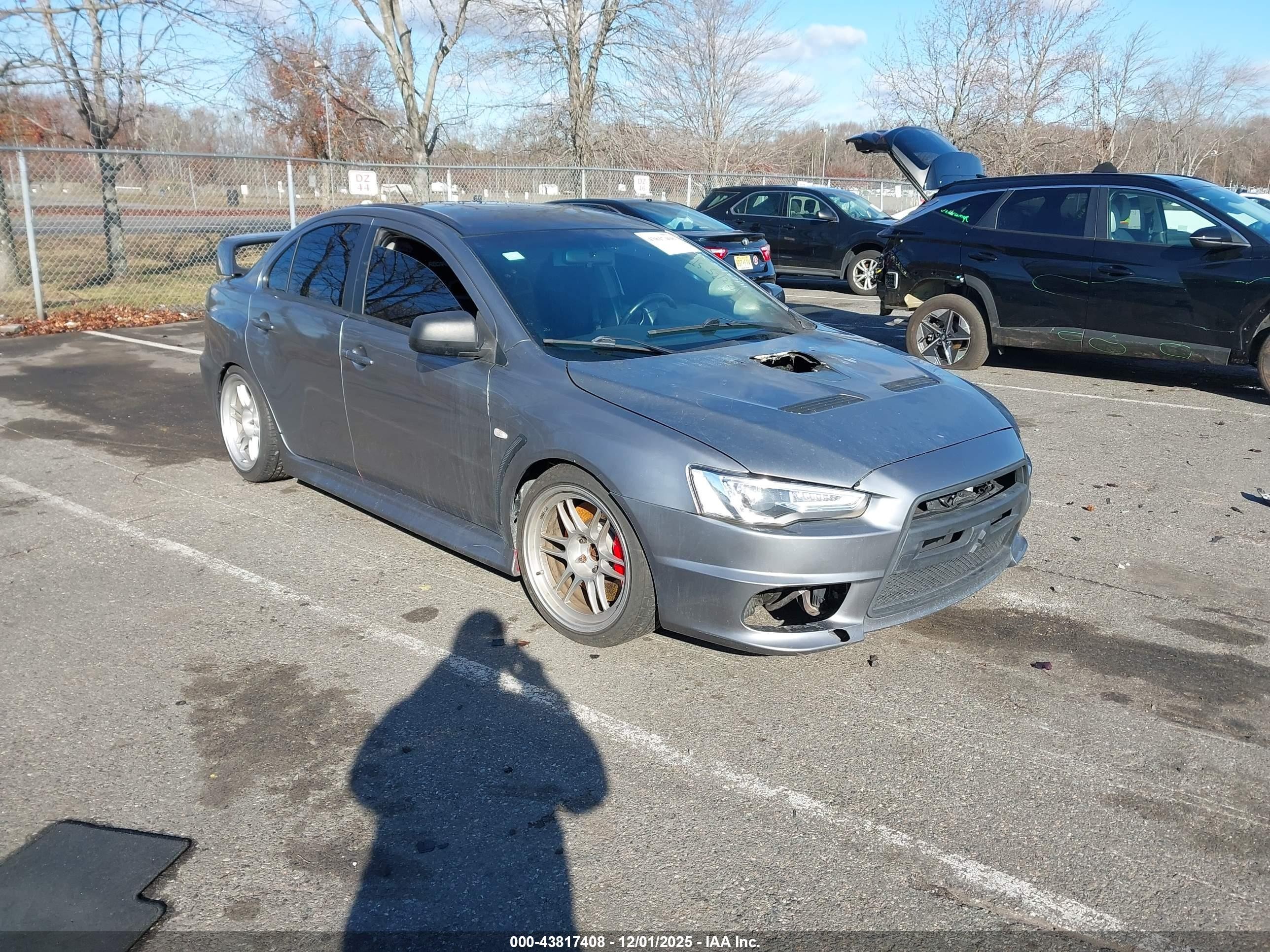 2014 Mitsubishi Lancer Evolution GSR, VIN JA32W8FVXEU016178 — Burn