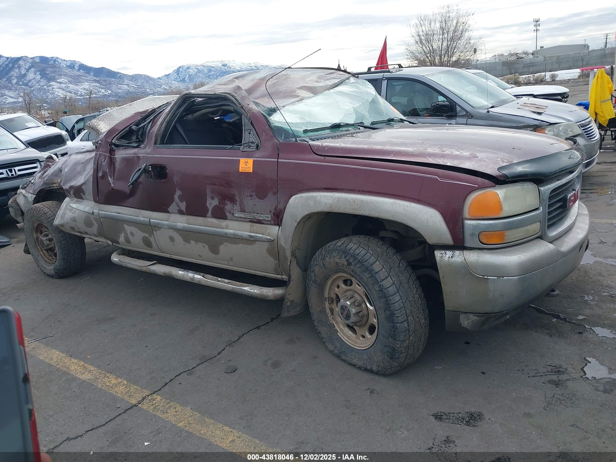 2002 GMC Sierra 2500 SLE, VIN 1GTGK29U72Z141687 — Rollover