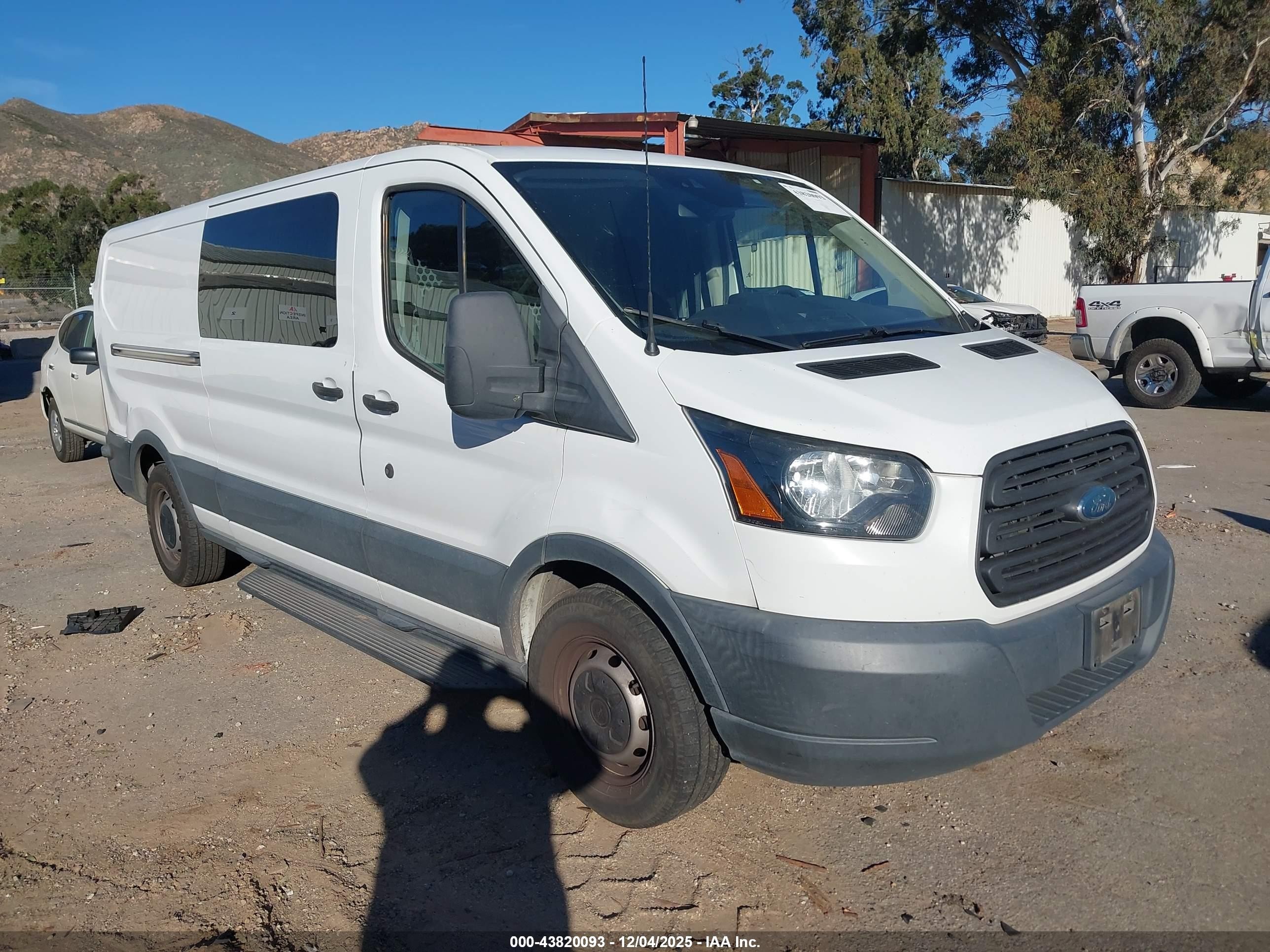 2018 Ford Transit Cargo, VIN 1FTYE2YM8JKA80709 — Side