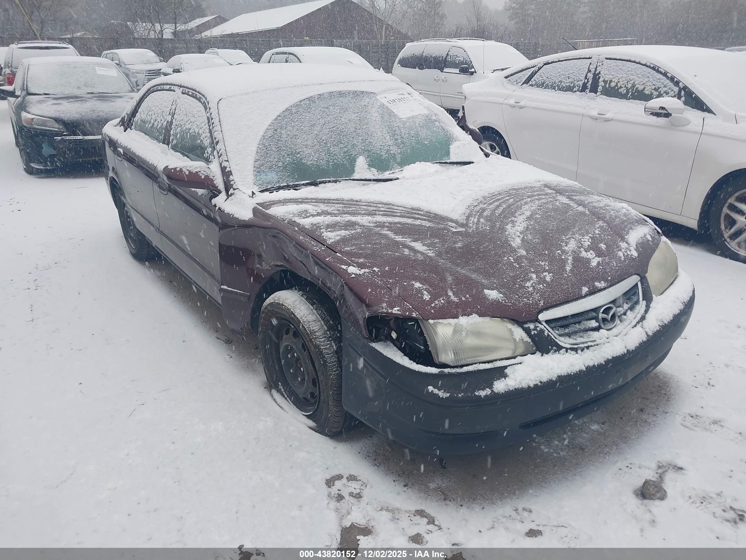 2000 Mazda 626 LX, VIN 1YVGF22C5Y5118148 — Front end