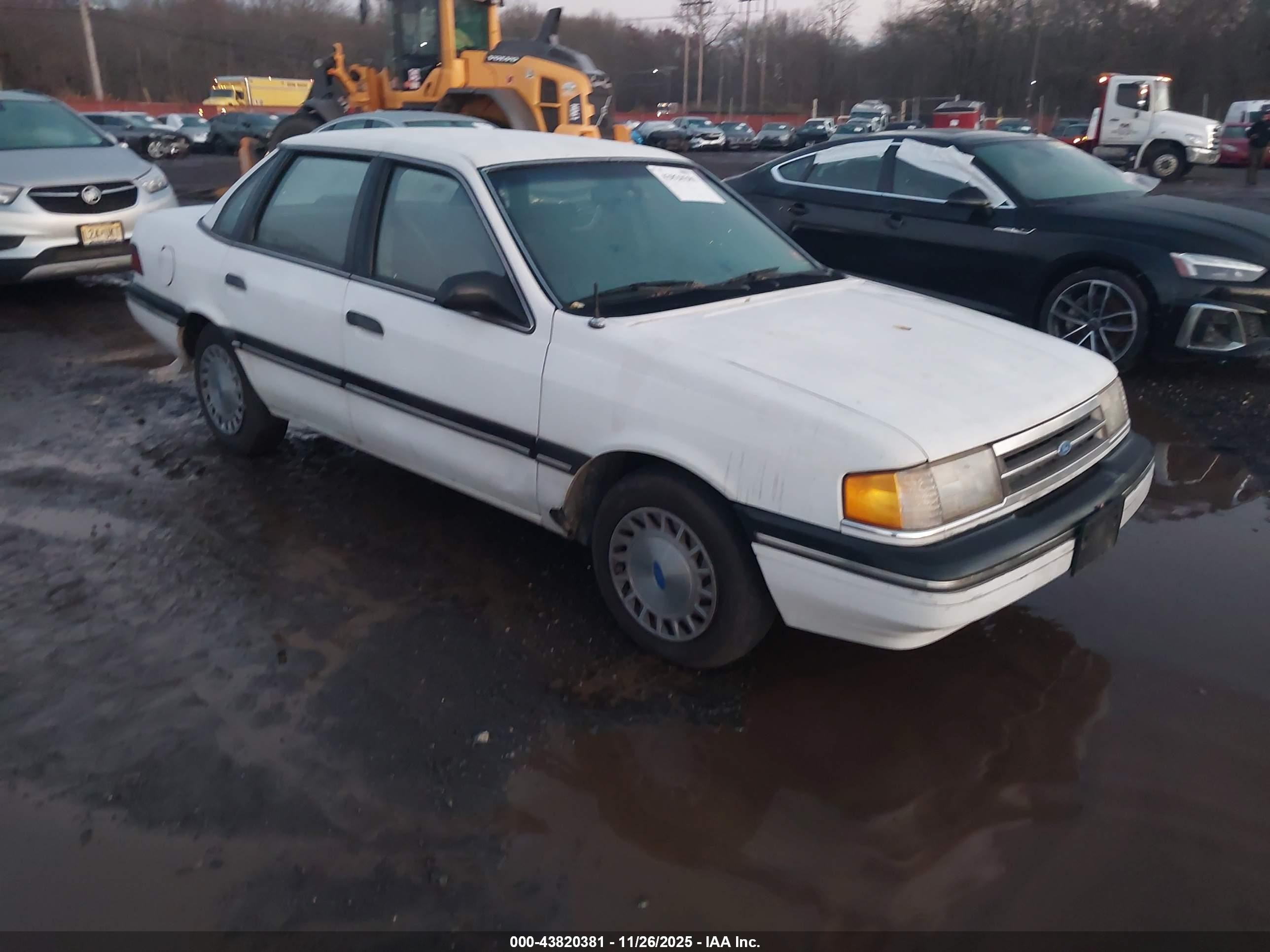 1989 Ford Tempo GL, VIN 2FAPP36X0KB153484 — Normal wear
