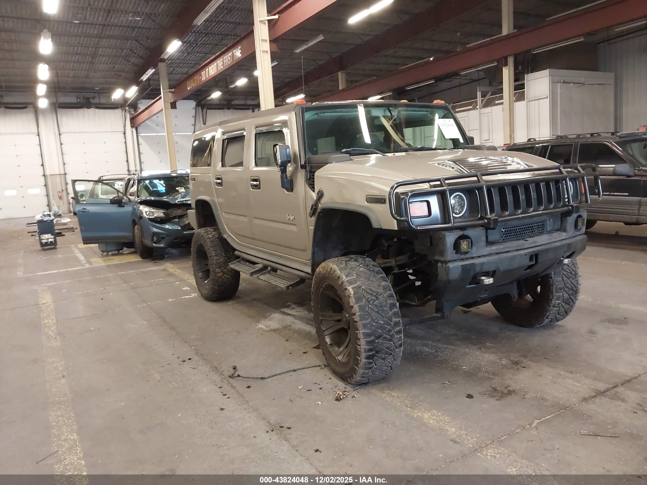 2005 Hummer H2 SUV, VIN 5GRGN23U15H102229 — Theft recovery