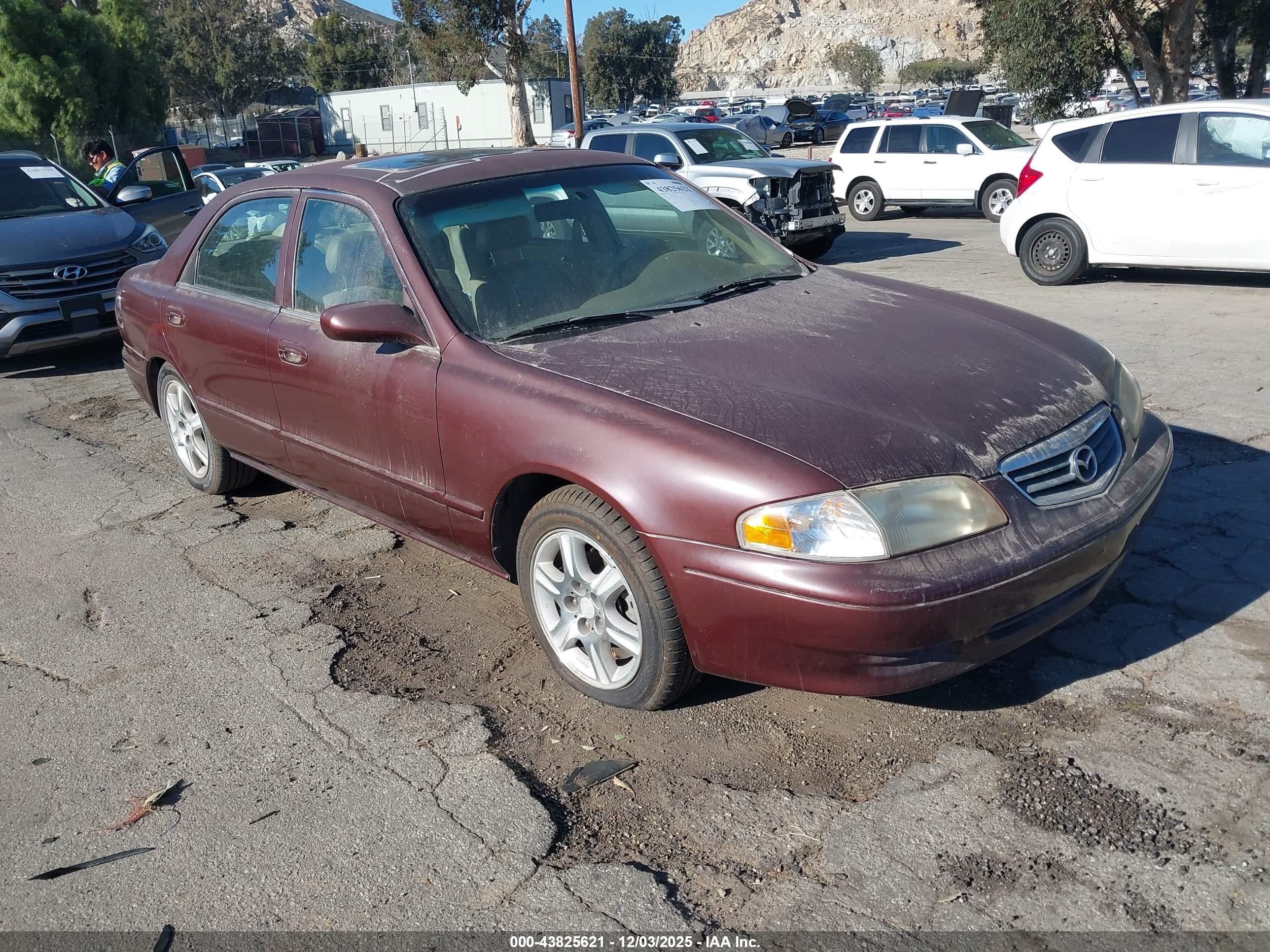 2000 Mazda 626 LX, VIN 1YVGF22D9Y5121644 — Normal wear