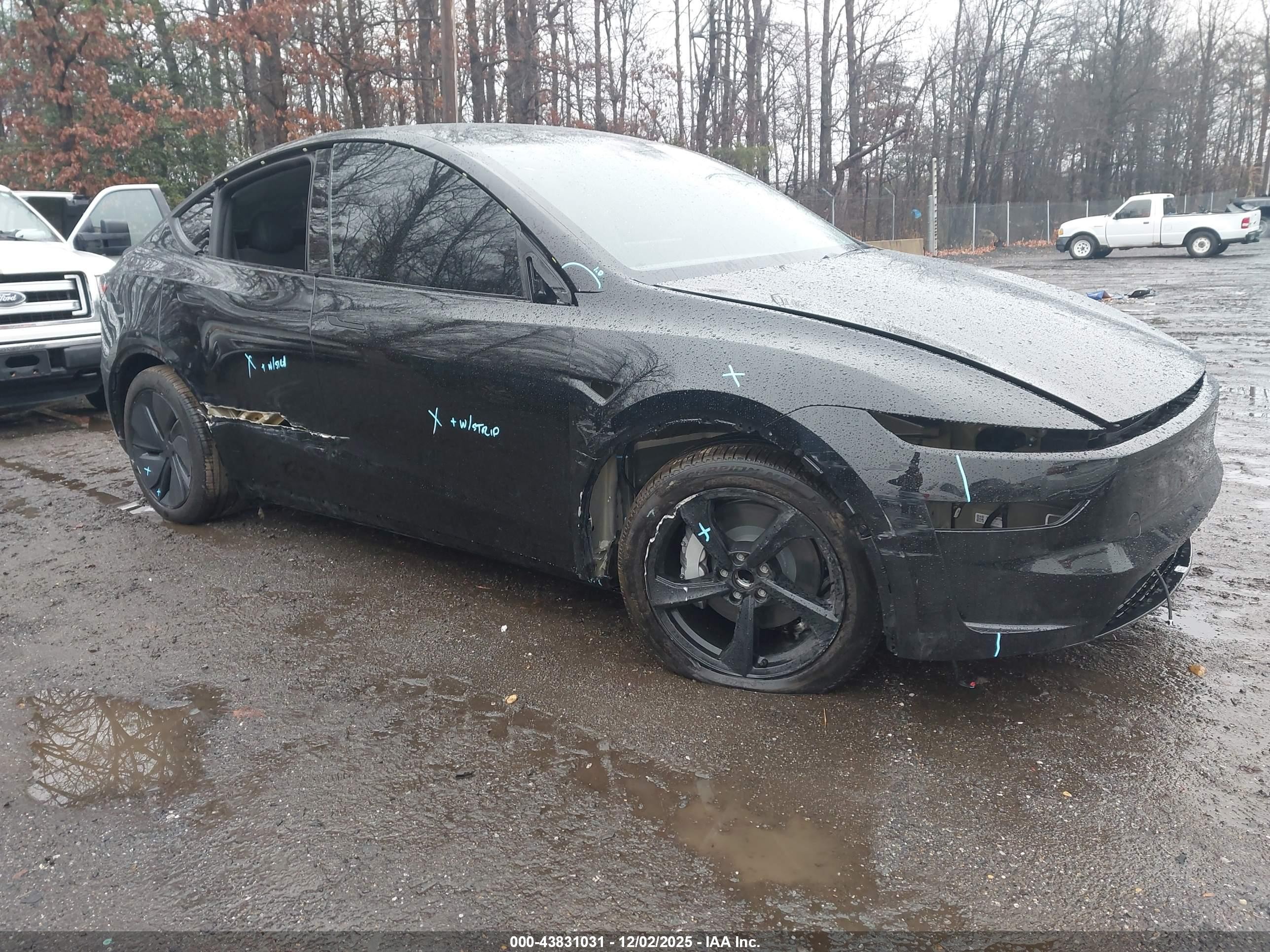 2026 Tesla Model Y Long Range, VIN 7SAYGDED3TA459188 — Side