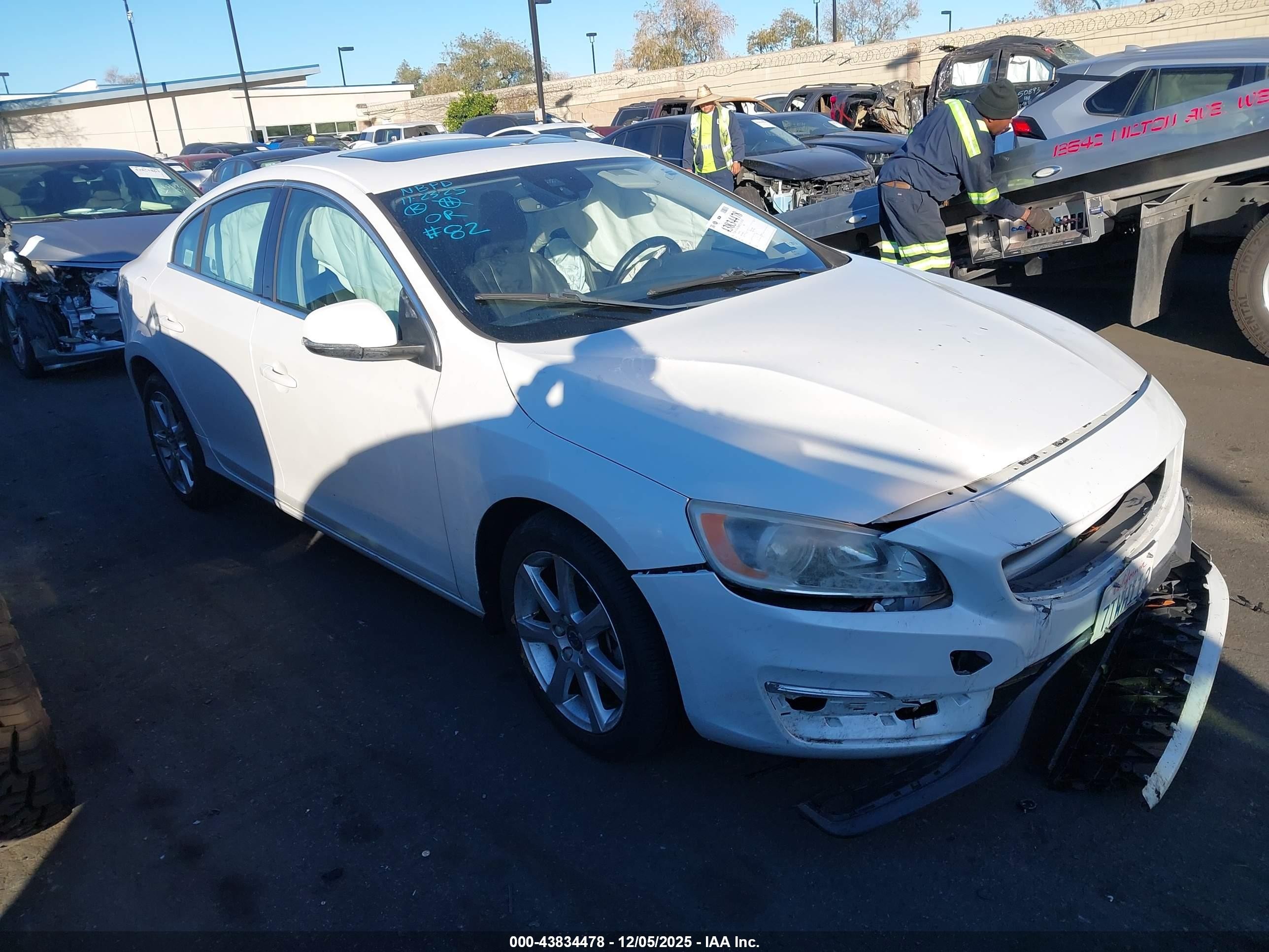 2016 Volvo S60 T5 Drive-E Premier, VIN YV126MFK1G2409642 — Side