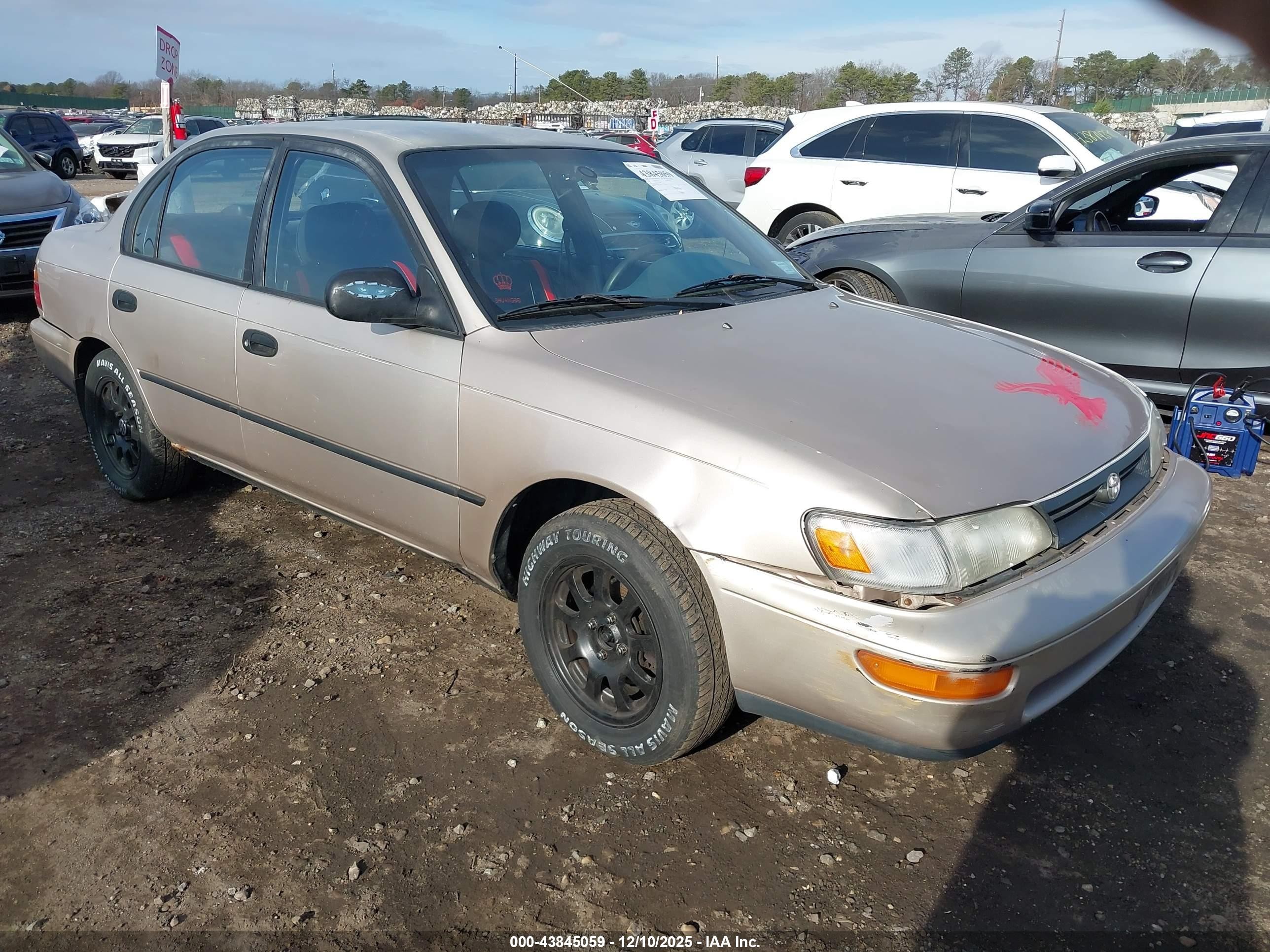 1995 Toyota Corolla DX, VIN 2T1AE09B2SC118649 — Side