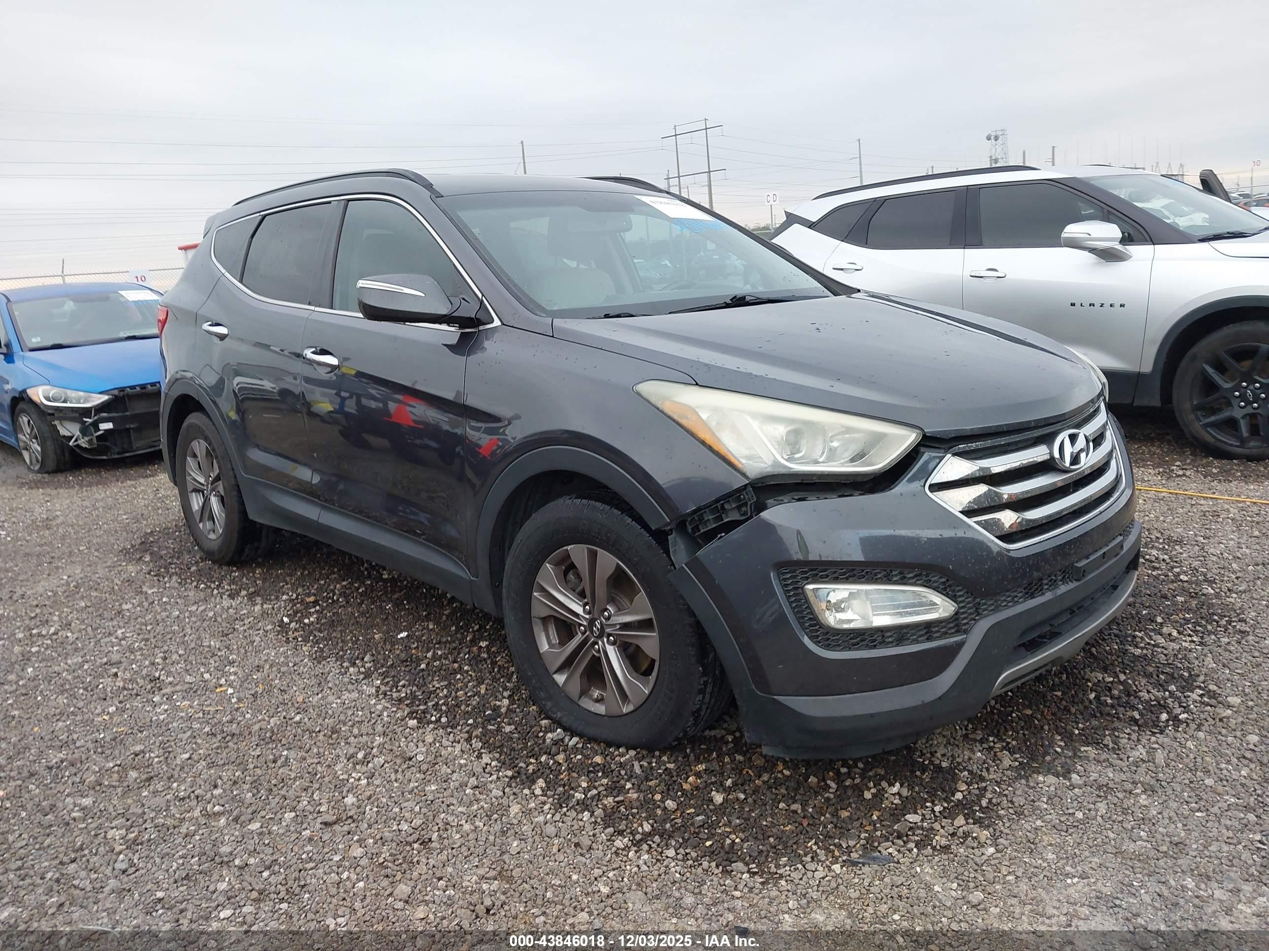 2015 Hyundai Santa Fe, VIN 5XYZU3LB4FG269972 — Side