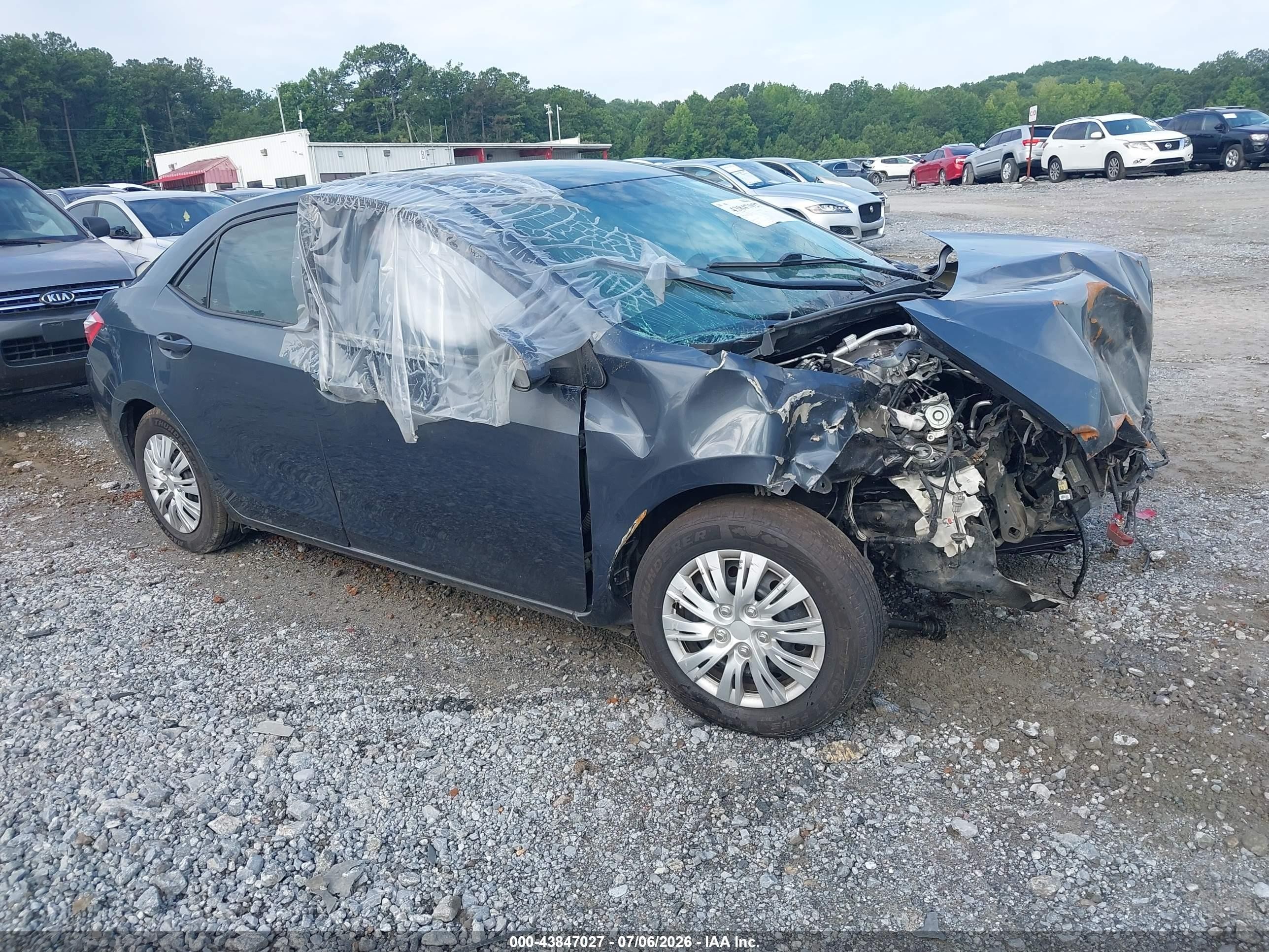 2016 Toyota Corolla L, VIN 5YFBURHE4GP544437 — Front end
