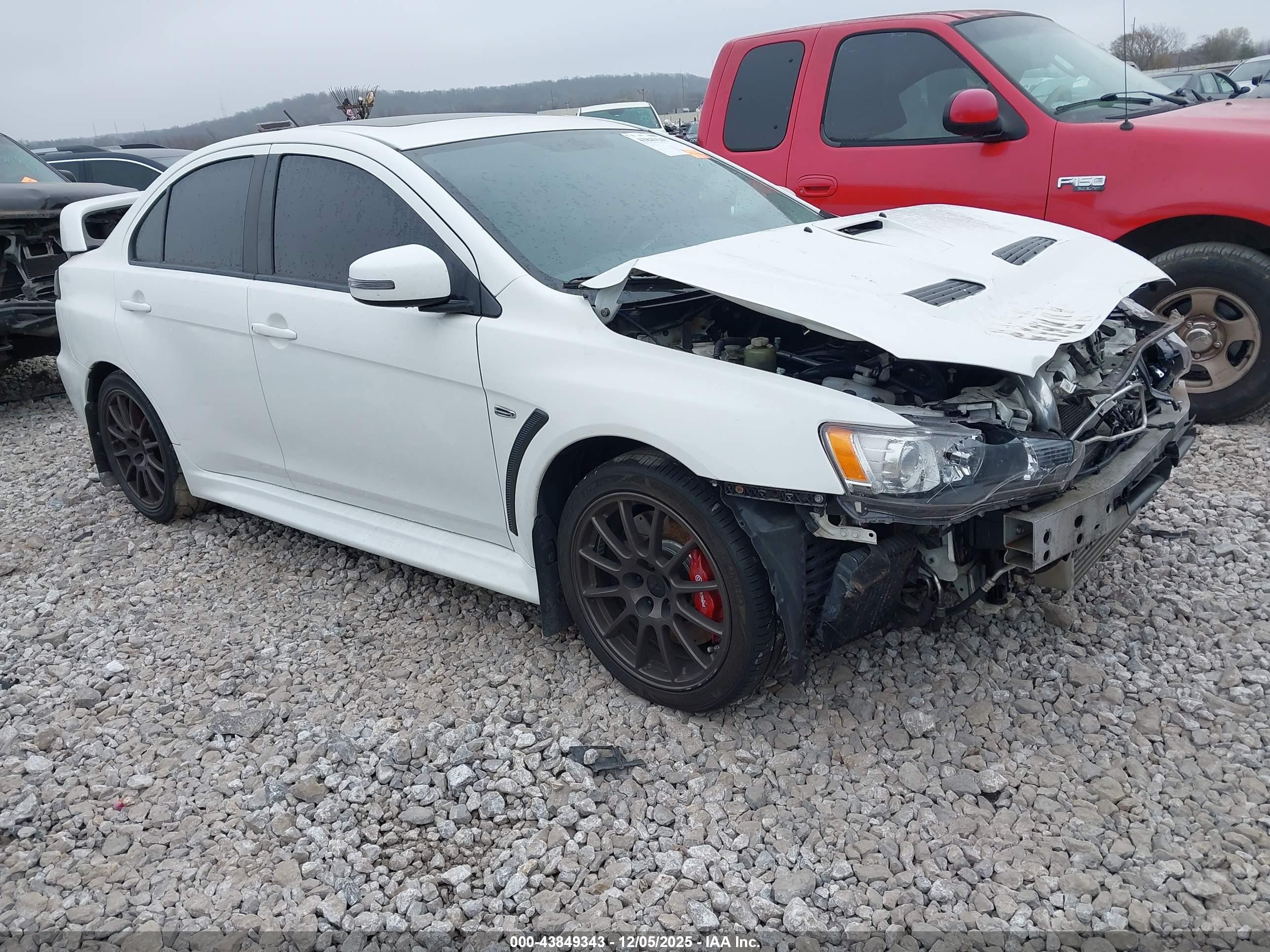 2015 Mitsubishi Lancer Evolution GSR, VIN JA32W8FV3FU020509 — Front end
