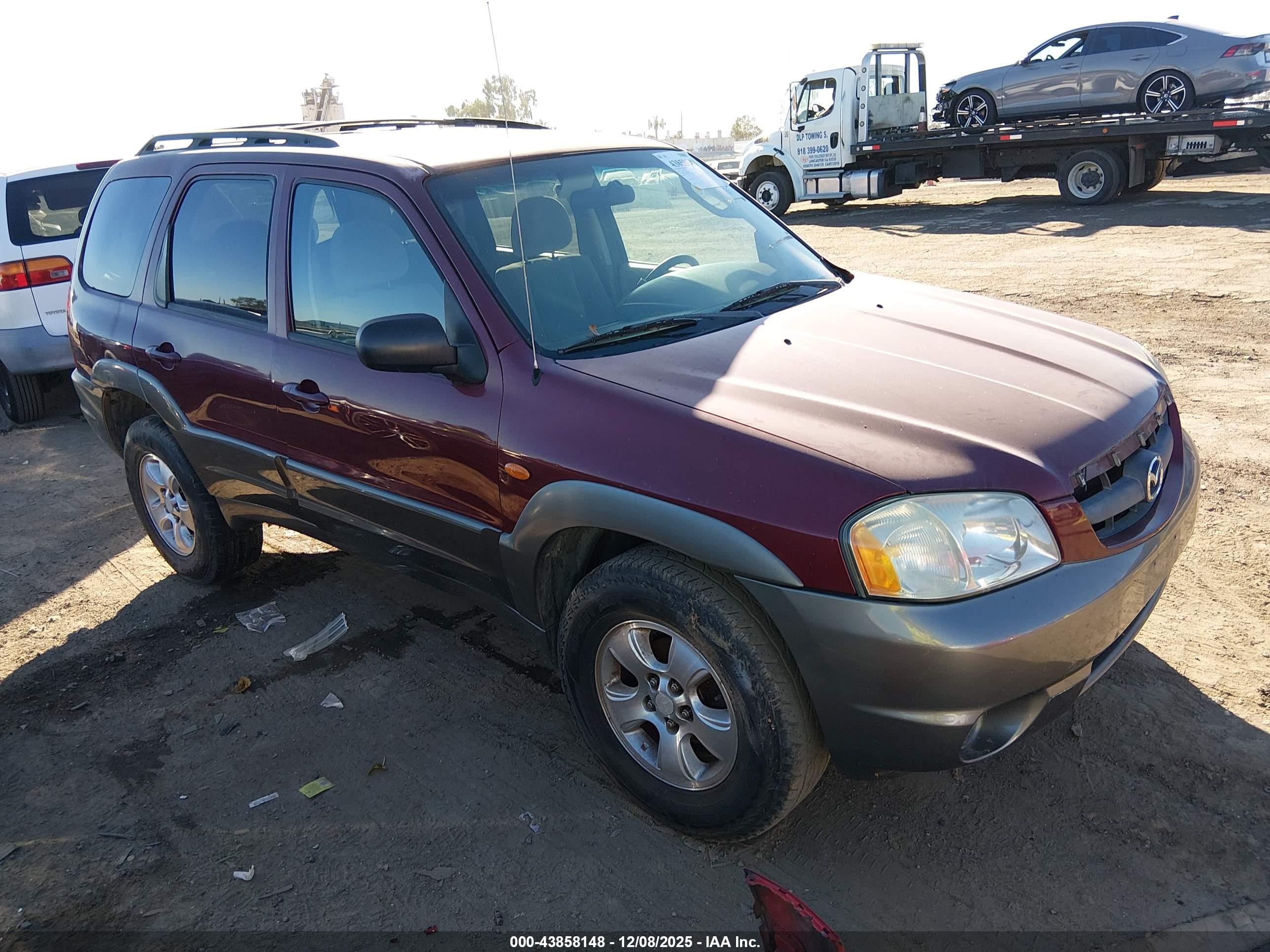 2003 Mazda Tribute LX, VIN 4F2YZ04173KM06281 — Rear end