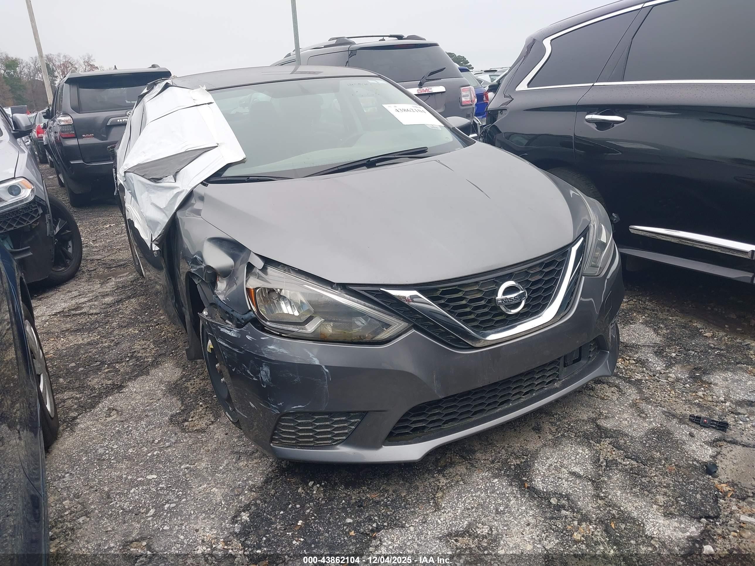 2019 Nissan Sentra S, VIN 3N1AB7AP5KY323278 — Бок