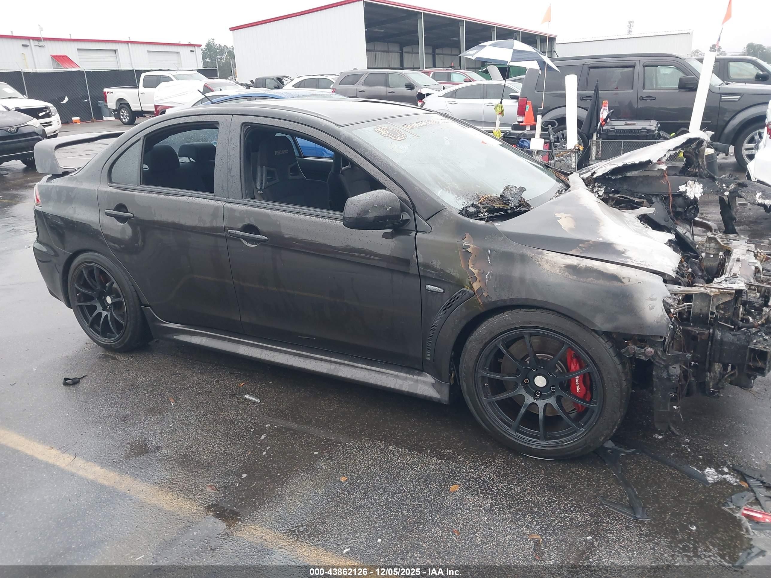 2014 Mitsubishi Lancer Evolution GSR, VIN JA32W8FV7EU020737 — Engine fire