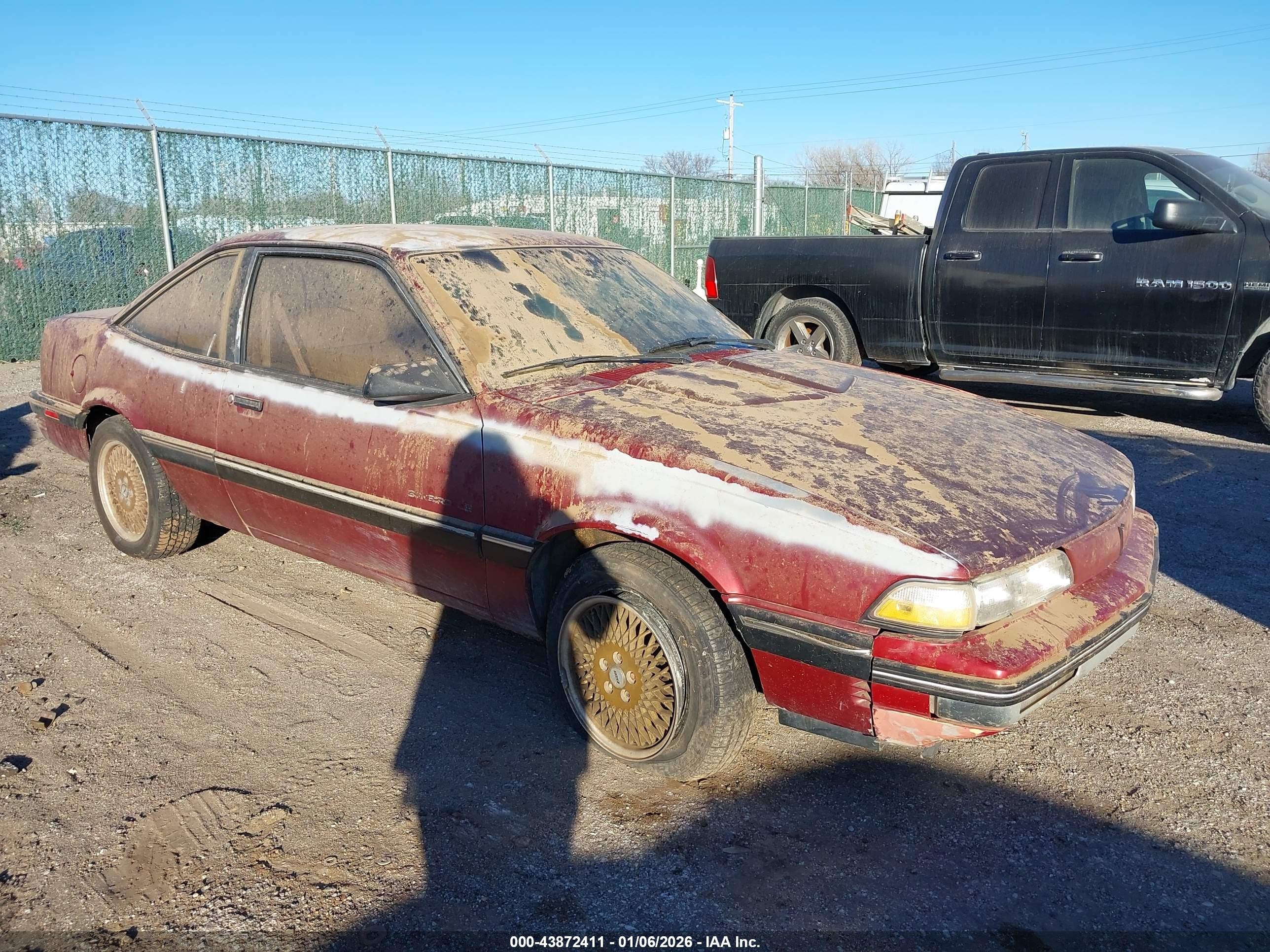 1990 Pontiac Sunbird, VIN 1G2JB14K8L7526053 — Normal wear