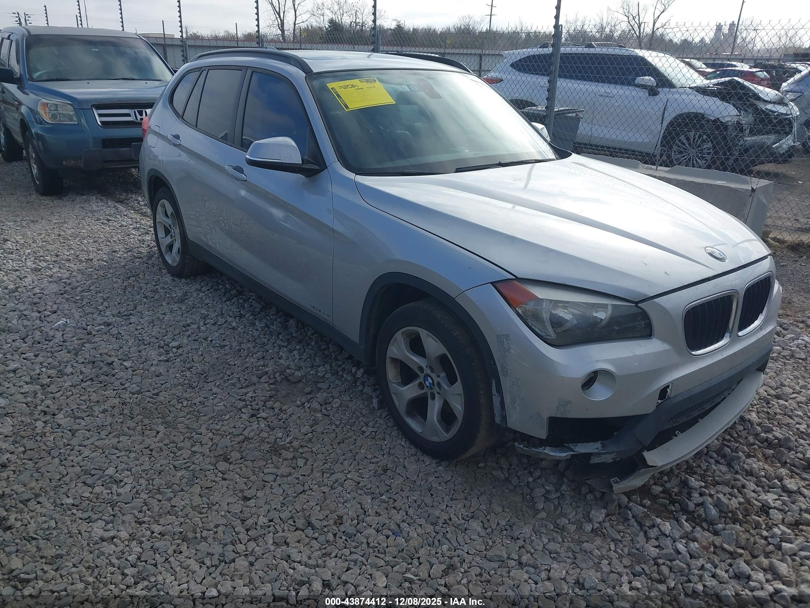 2015 BMW X1 sDrive28i, VIN WBAVM1C55FVW58140 — Front end
