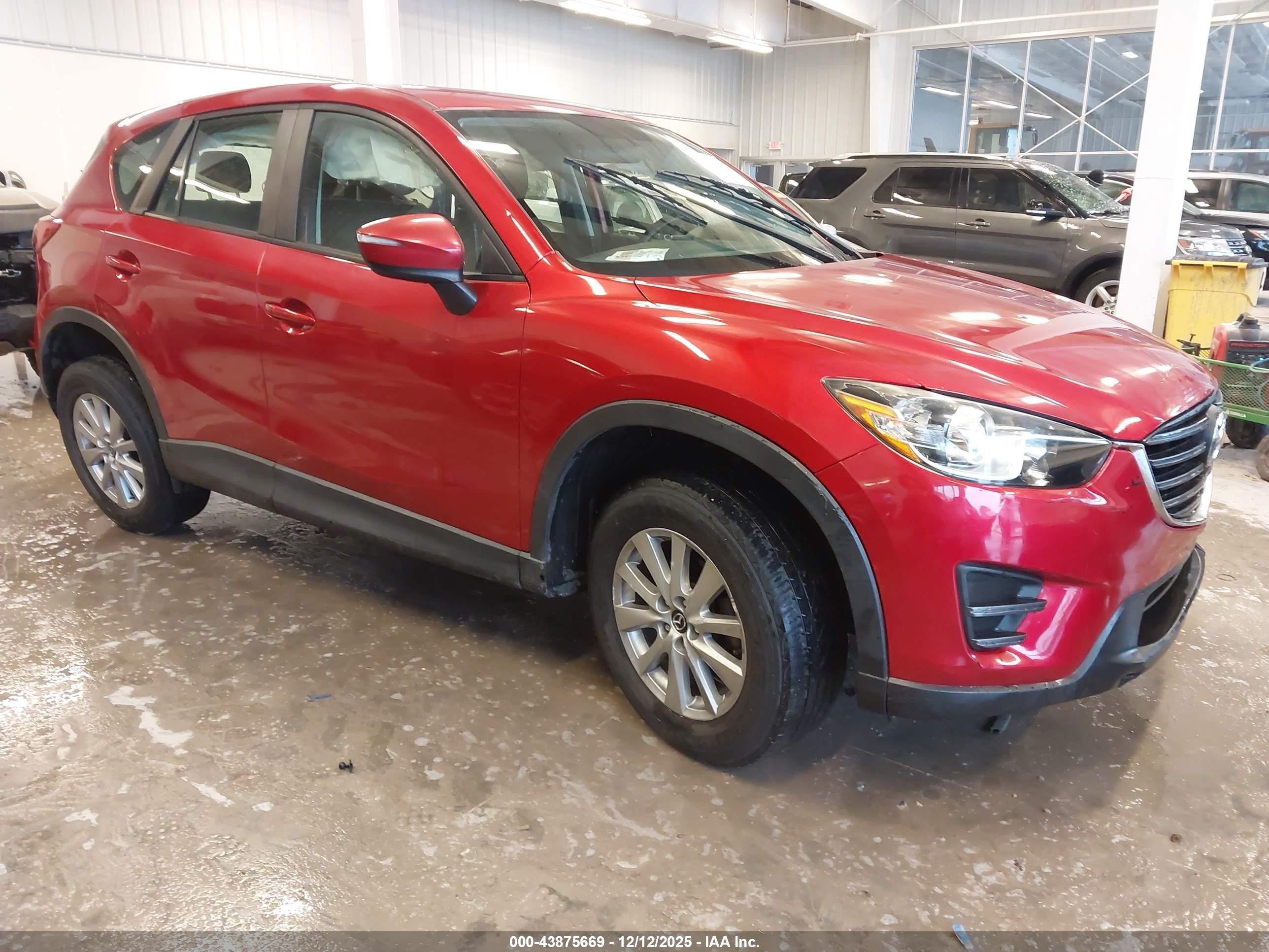 2016 Mazda CX-5 Sport, VIN JM3KE4BYXG0693391 — Side