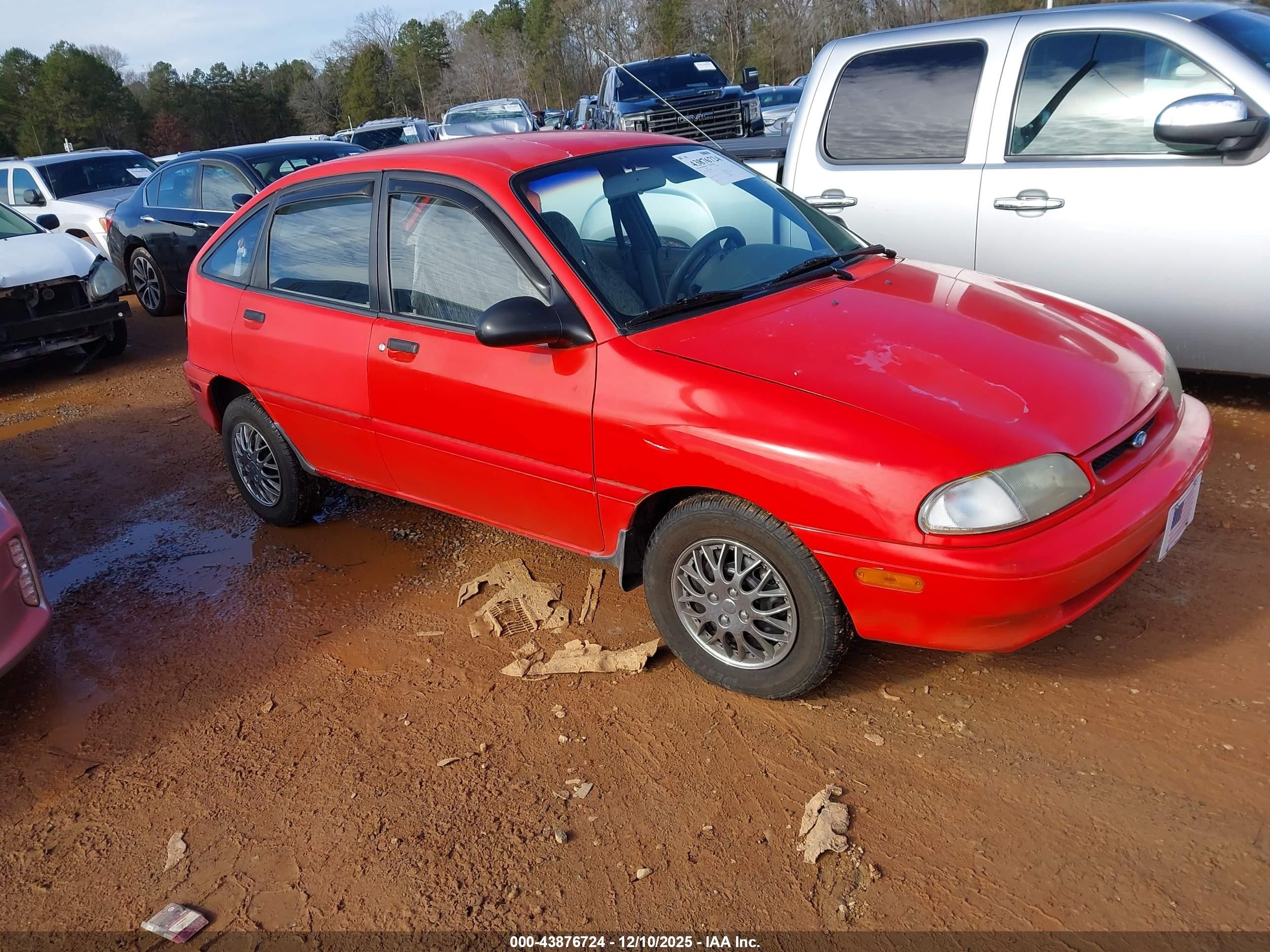 1995 Ford Aspire, VIN KNJLT06H5S6120858 — Side