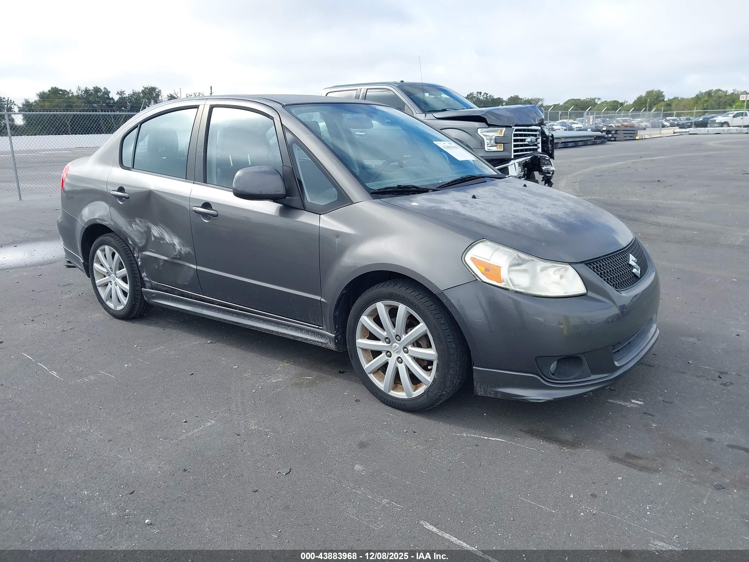 2012 Suzuki SX4 Sport SE, VIN JS2YC5A51C6300347 — Side