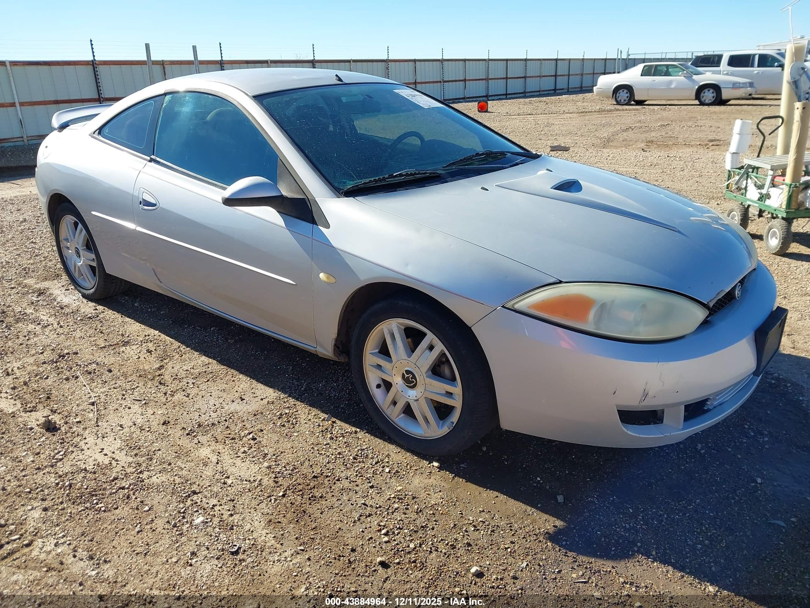 2002 Mercury Cougar, VIN 1ZWFT61L025621637 — Side