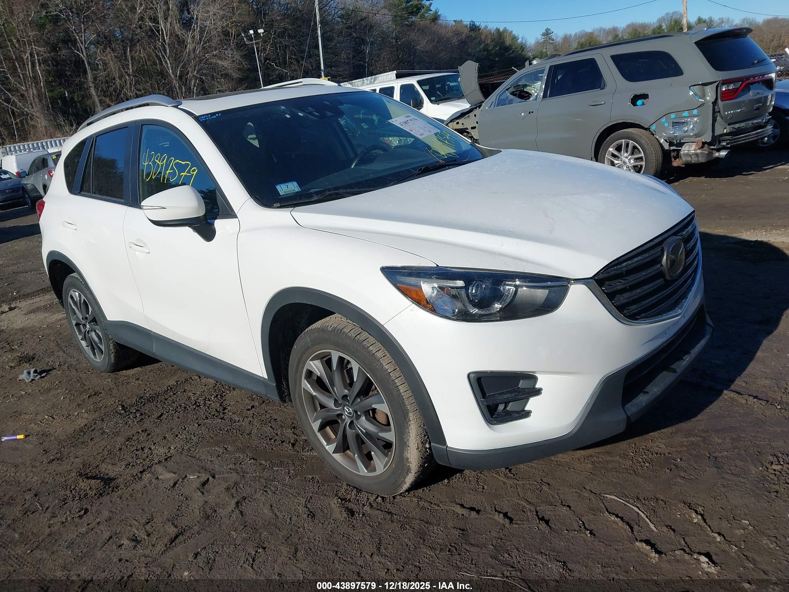 2016 Mazda CX-5 Grand Touring, VIN JM3KE4DYXG0858823 — Vandalism