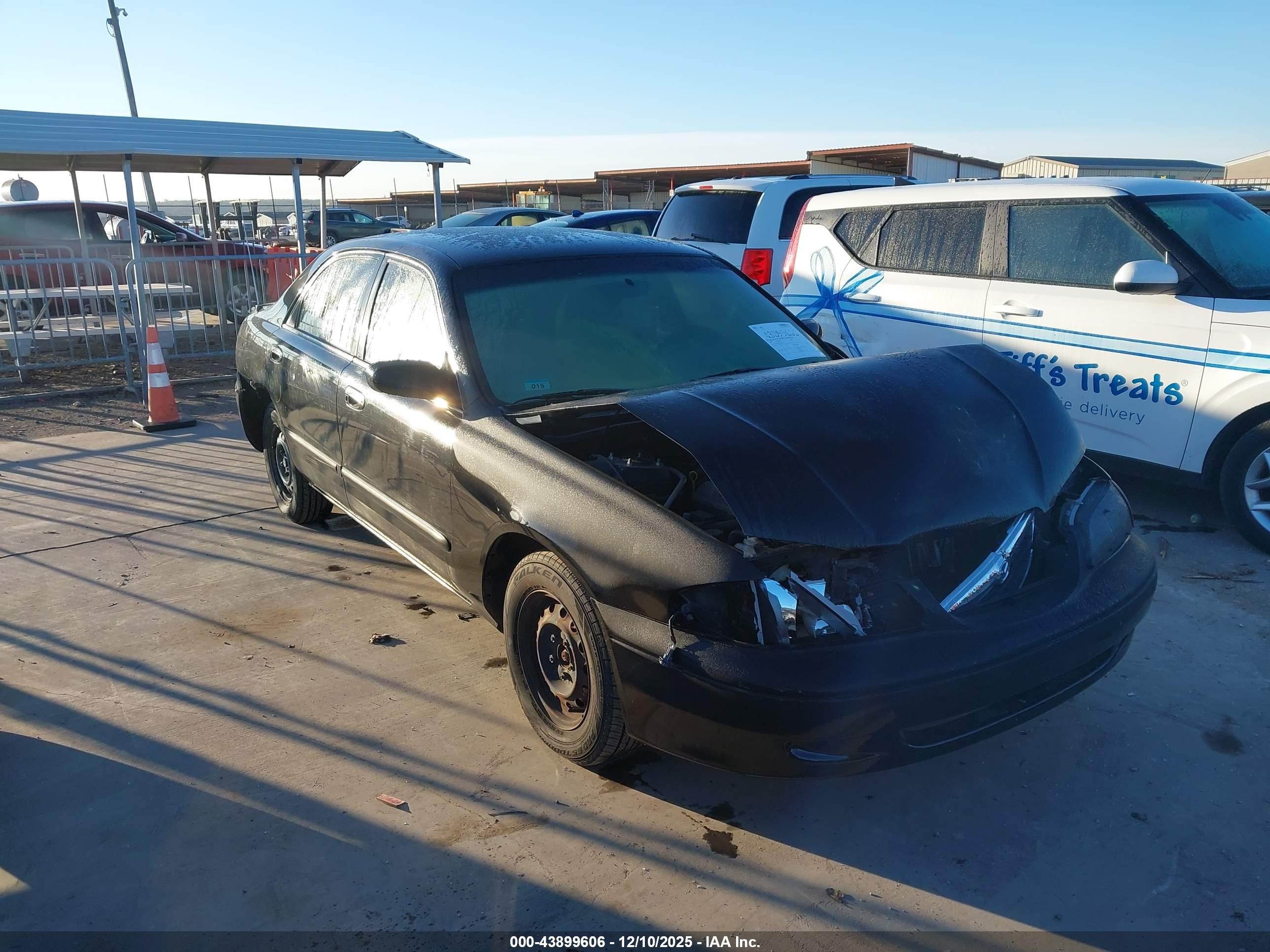 1999 Mazda 626 ES, VIN 1YVGF22C8X5834315 — Front end