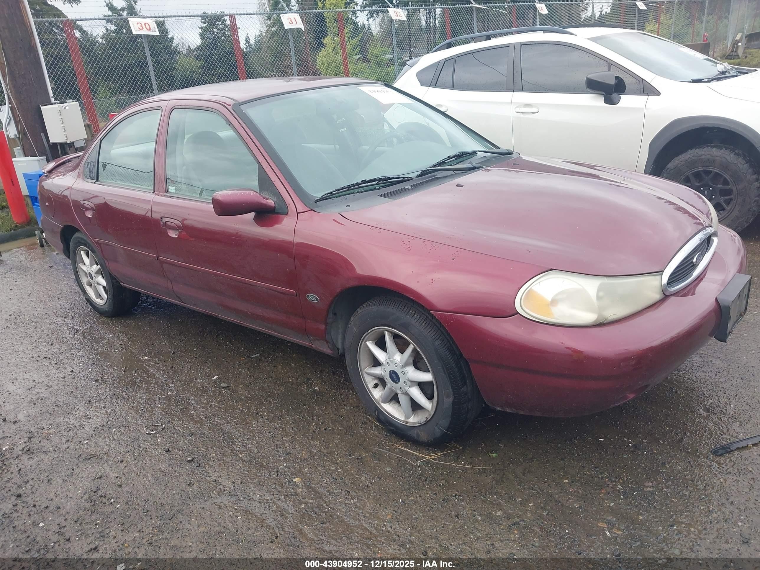 2000 Ford Contour SE Fleet, VIN 1FAFP66L5YK101888 — Rear end
