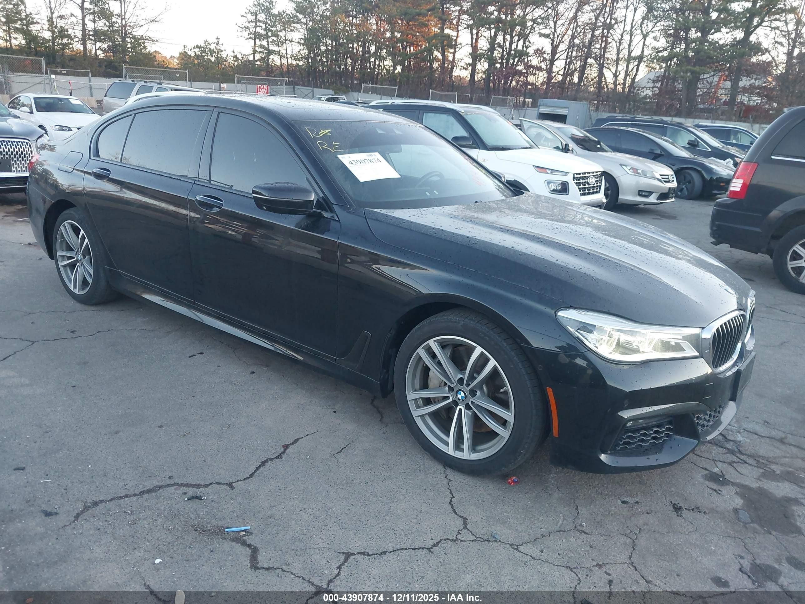 2016 BMW 7 Series 750i xDrive, VIN WBA7F2C57GG417422 — Rear end
