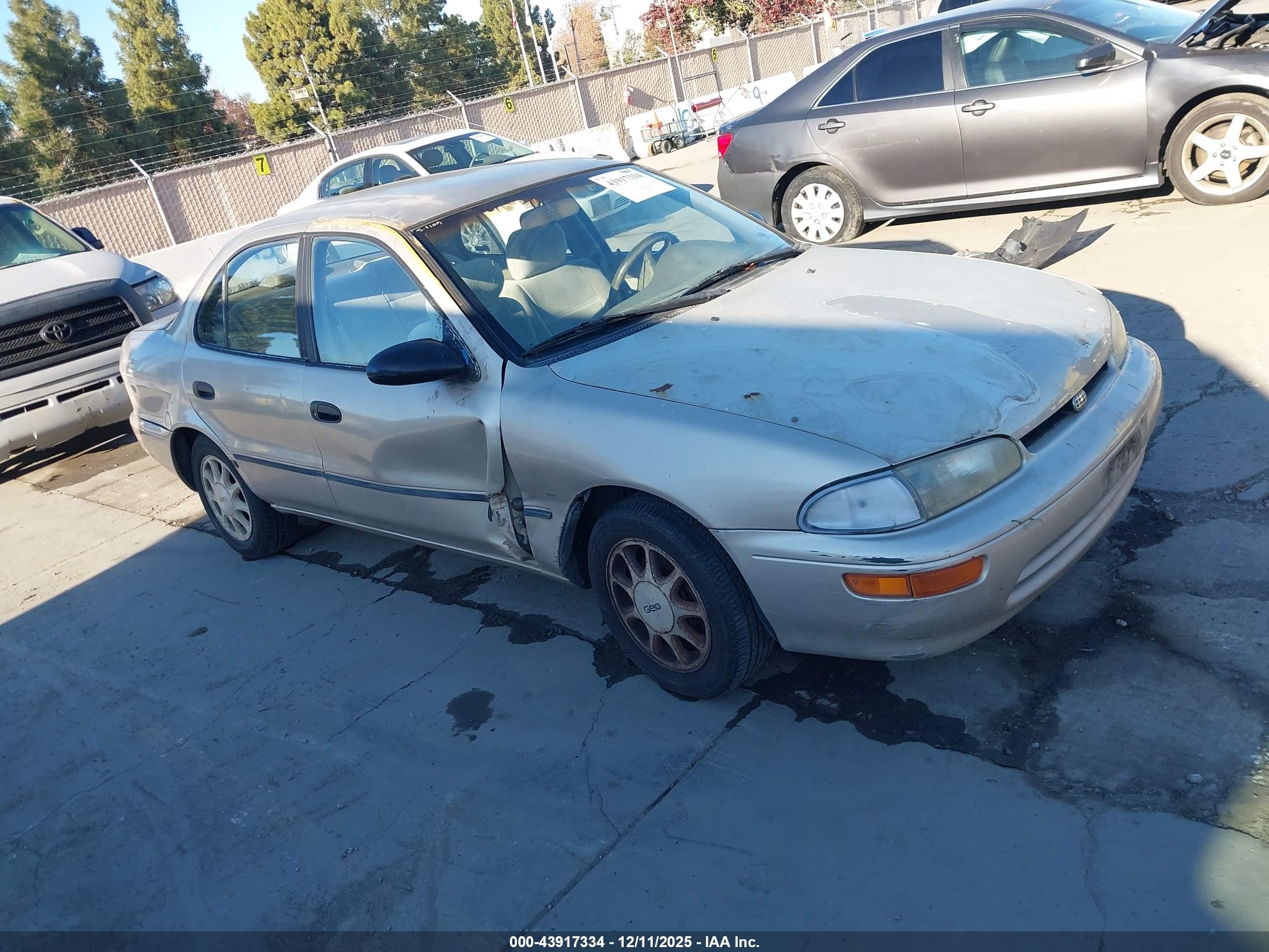 1995 Chevrolet Prizm, VIN 1Y1SK5283SZ021860 — Side