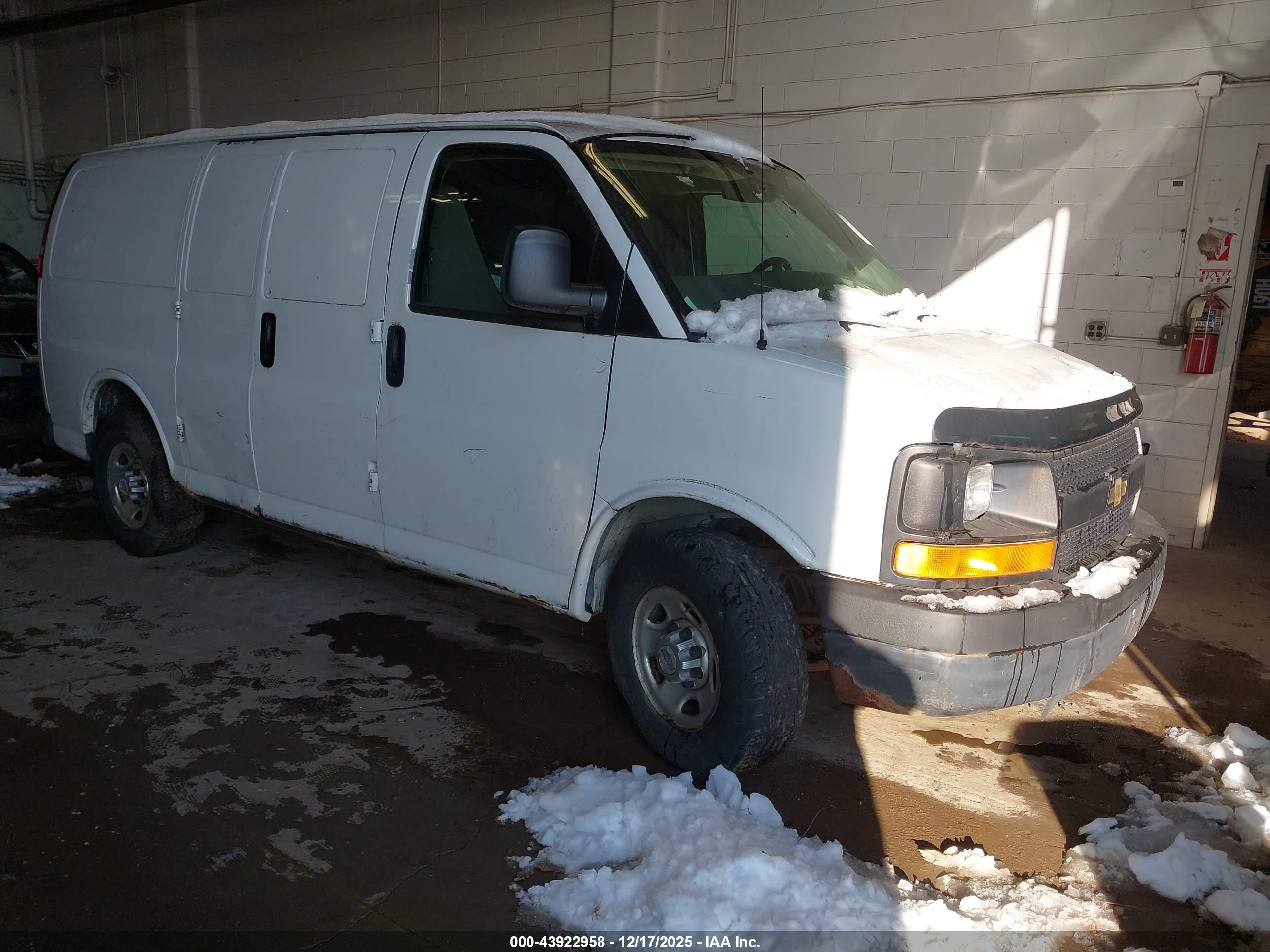 2011 Chevrolet Express Cargo, VIN 1GCWGFCA4B1125139 — Side