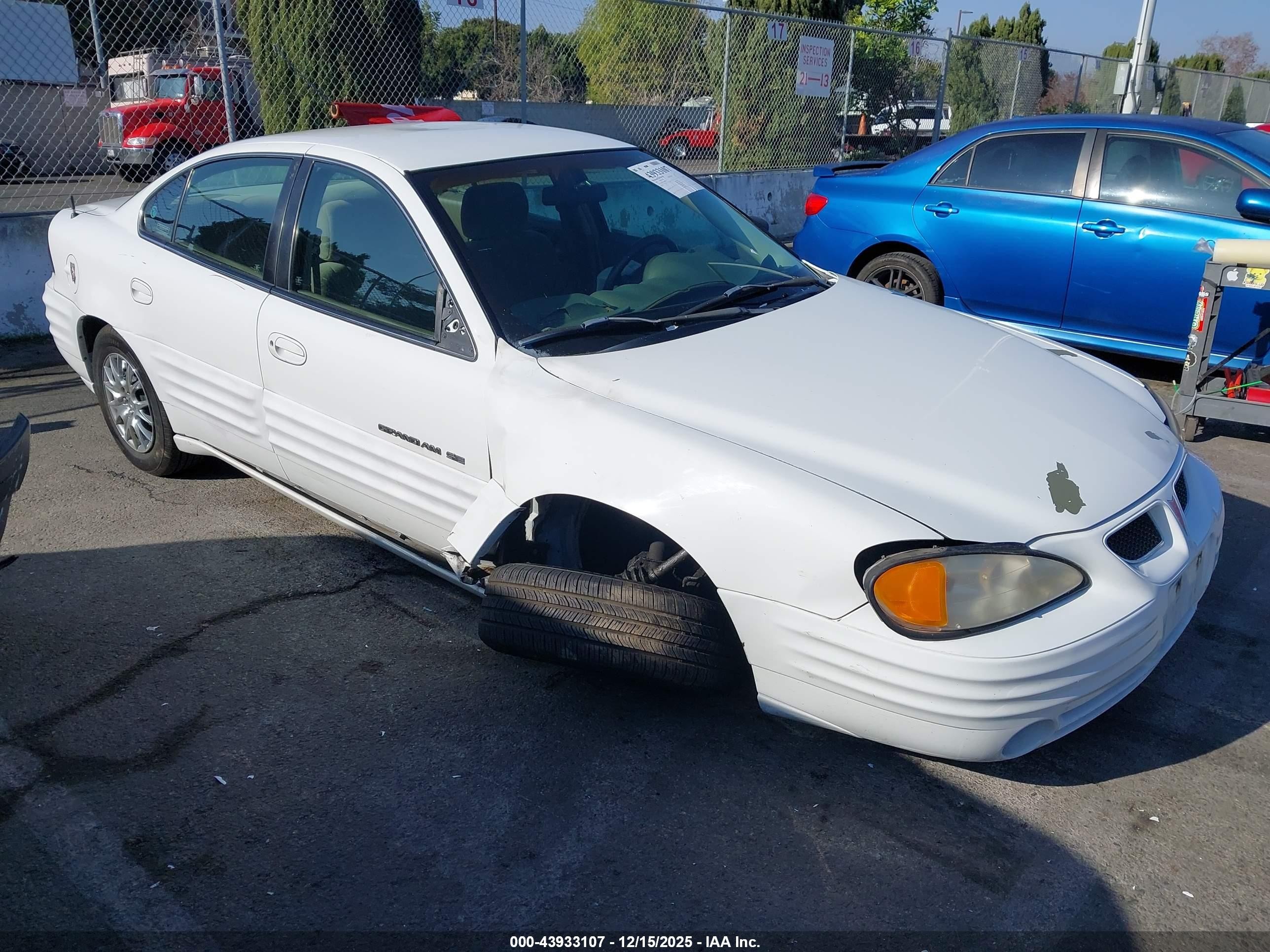 1999 Pontiac Grand Am SE1, VIN 1G2NE52T9XM833024 — Front end