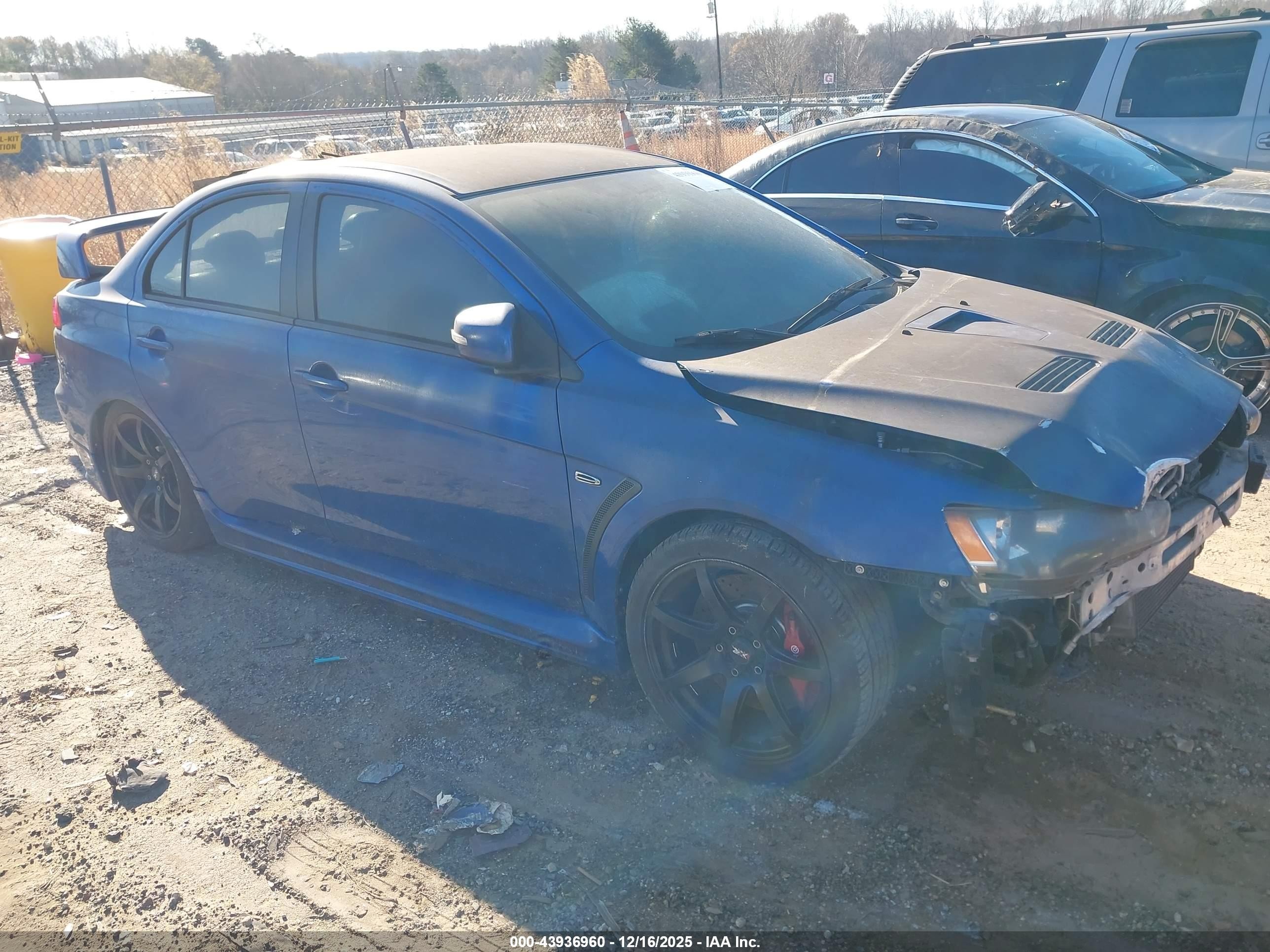 2015 Mitsubishi Lancer Evolution GSR, VIN JA32W8FV4FU023726 — Front end