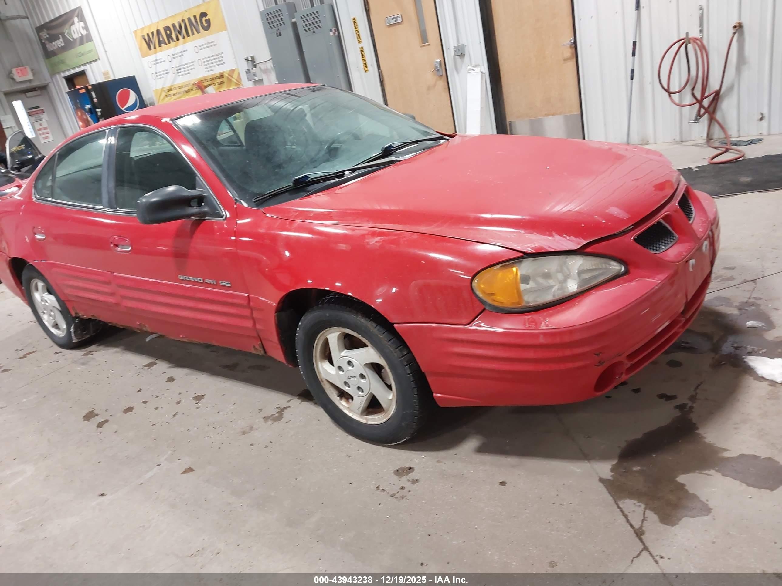 1999 Pontiac Grand Am SE1, VIN 1G2NE52EXXM863294 — Normal wear