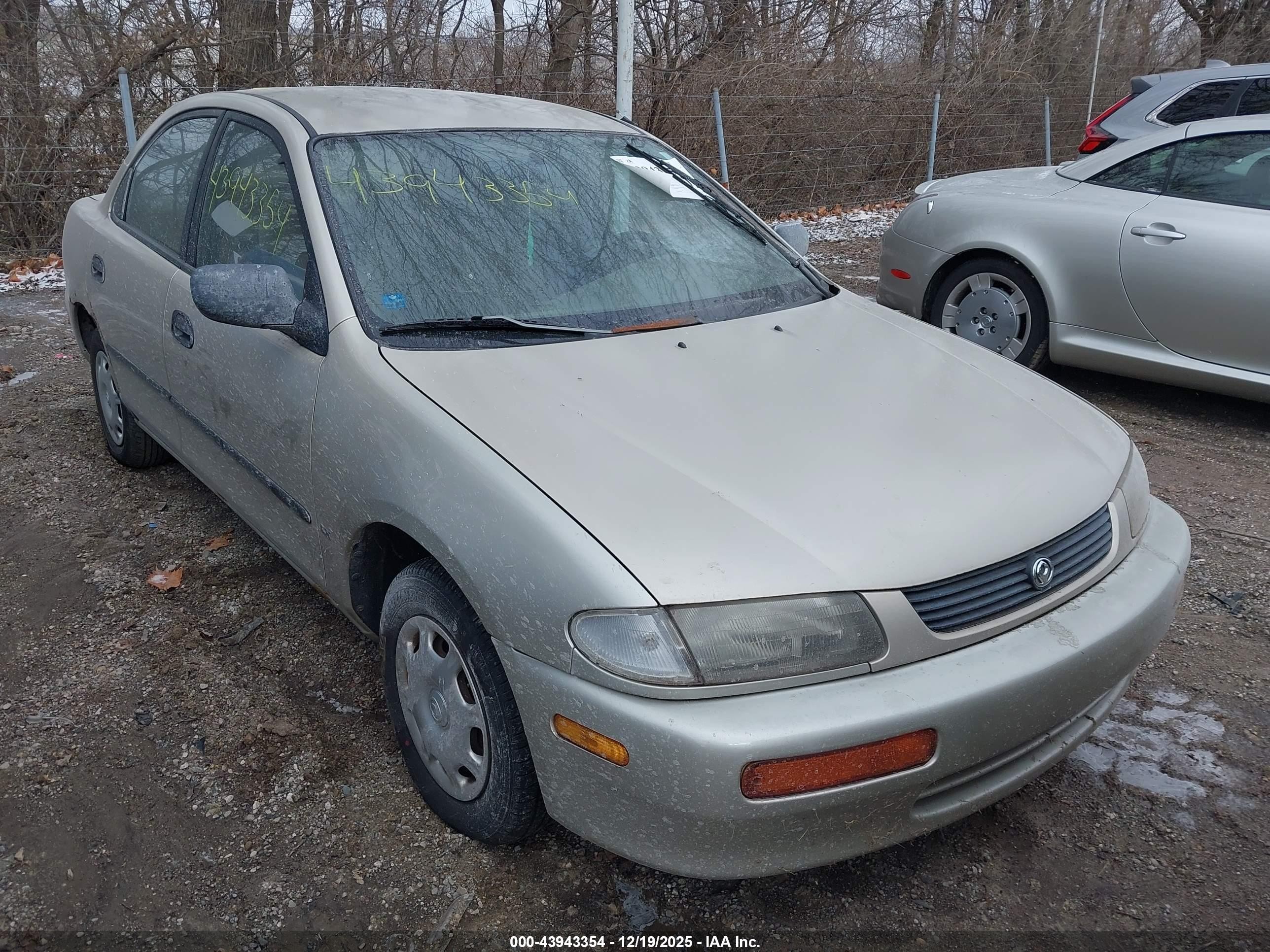1995 Mazda Protege, VIN JM1BA1412S0146711 — Зад