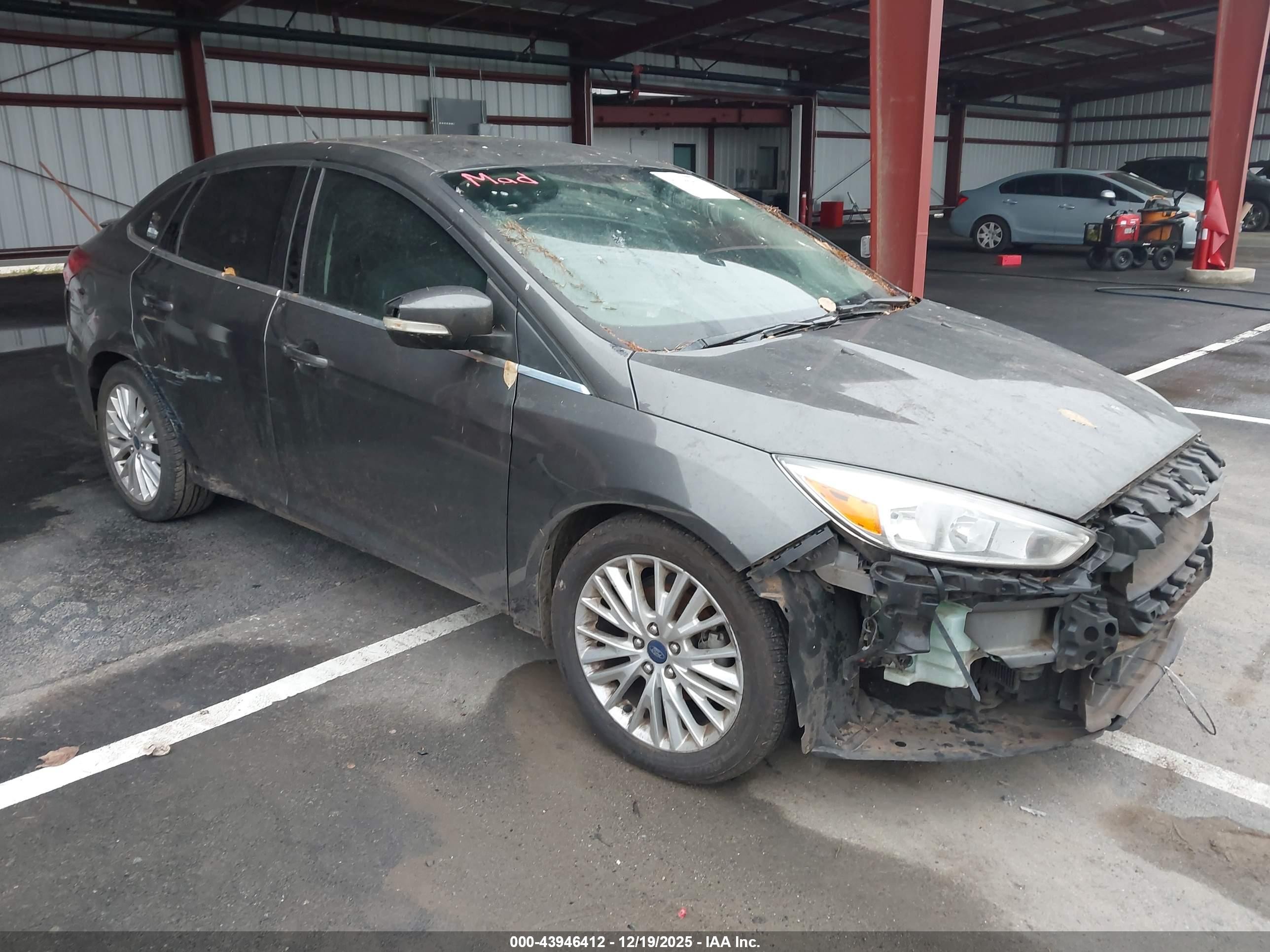 2015 Ford Focus Titanium, VIN 1FADP3J24FL315167 — Front end