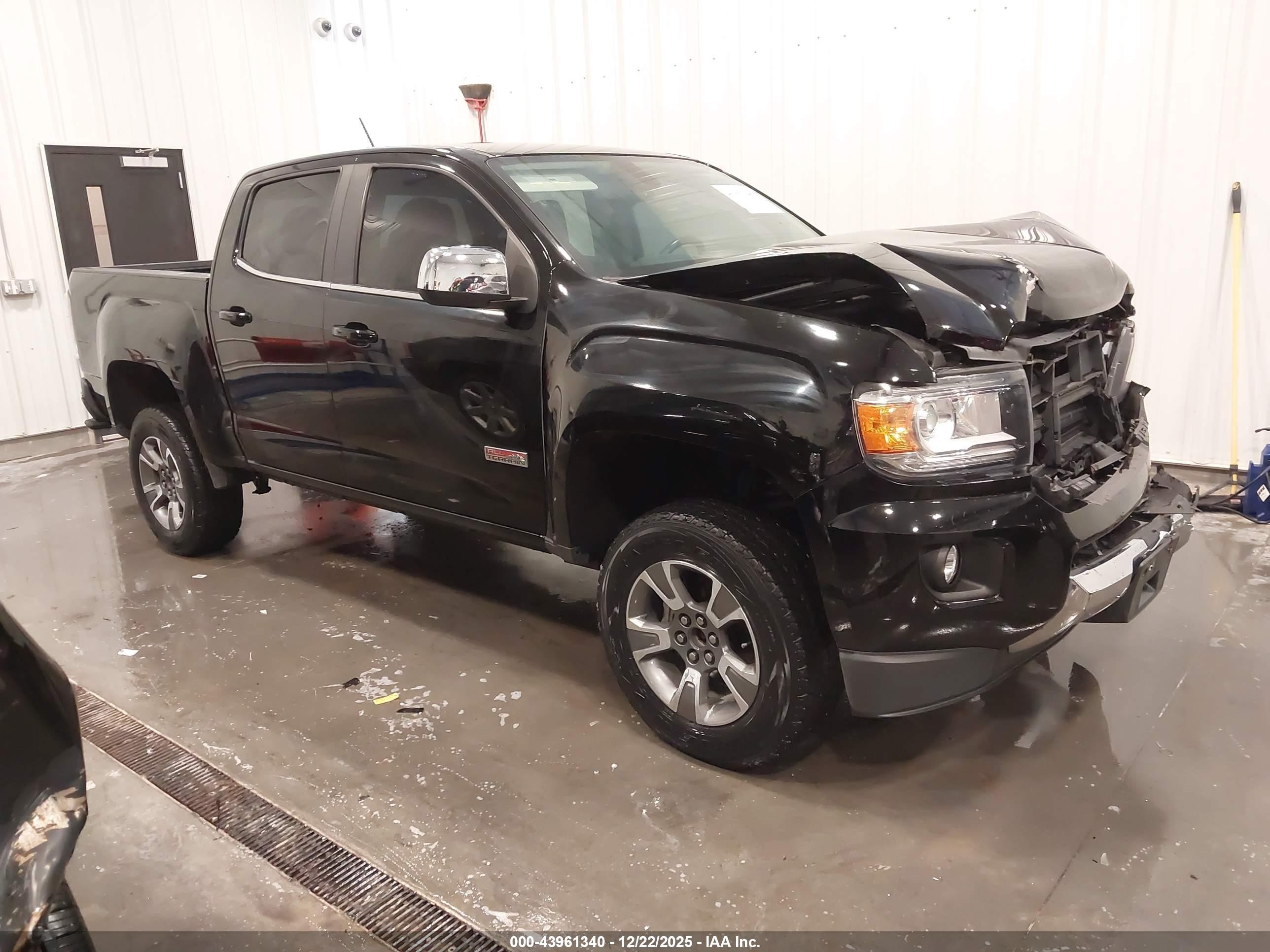 2015 GMC Canyon 4WD SLE, VIN 1GTG6BE32F1130344 — Front end