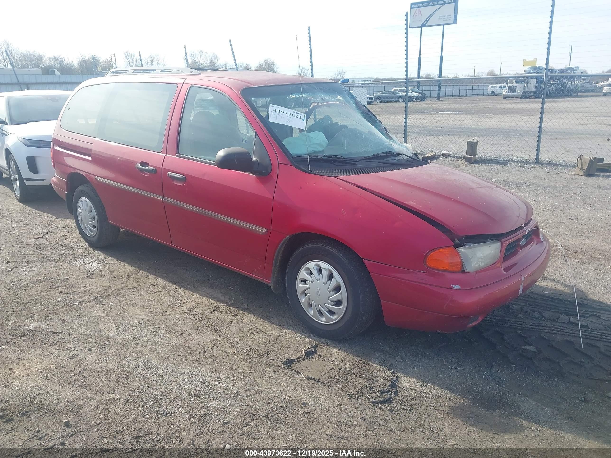 1998 Ford Windstar GL, VIN 2FMDA5140WBA54446 — Side
