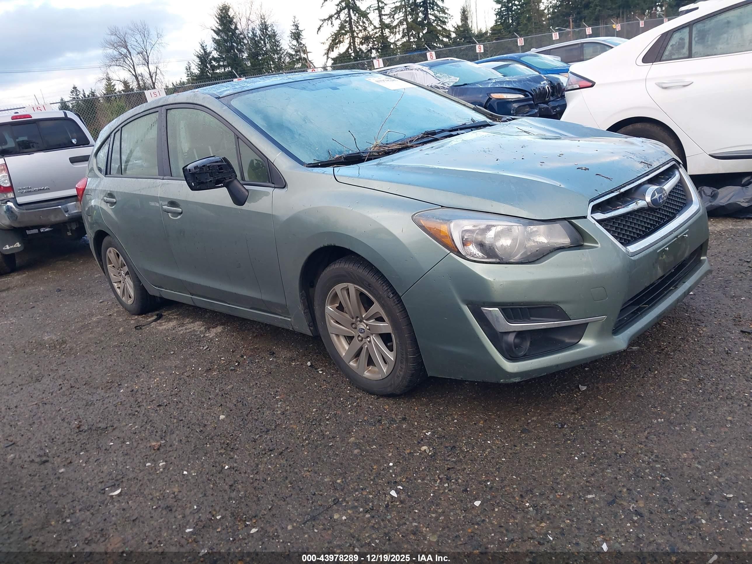 2015 Subaru Impreza Premium, VIN JF1GPAC66FH252996 — Storm
