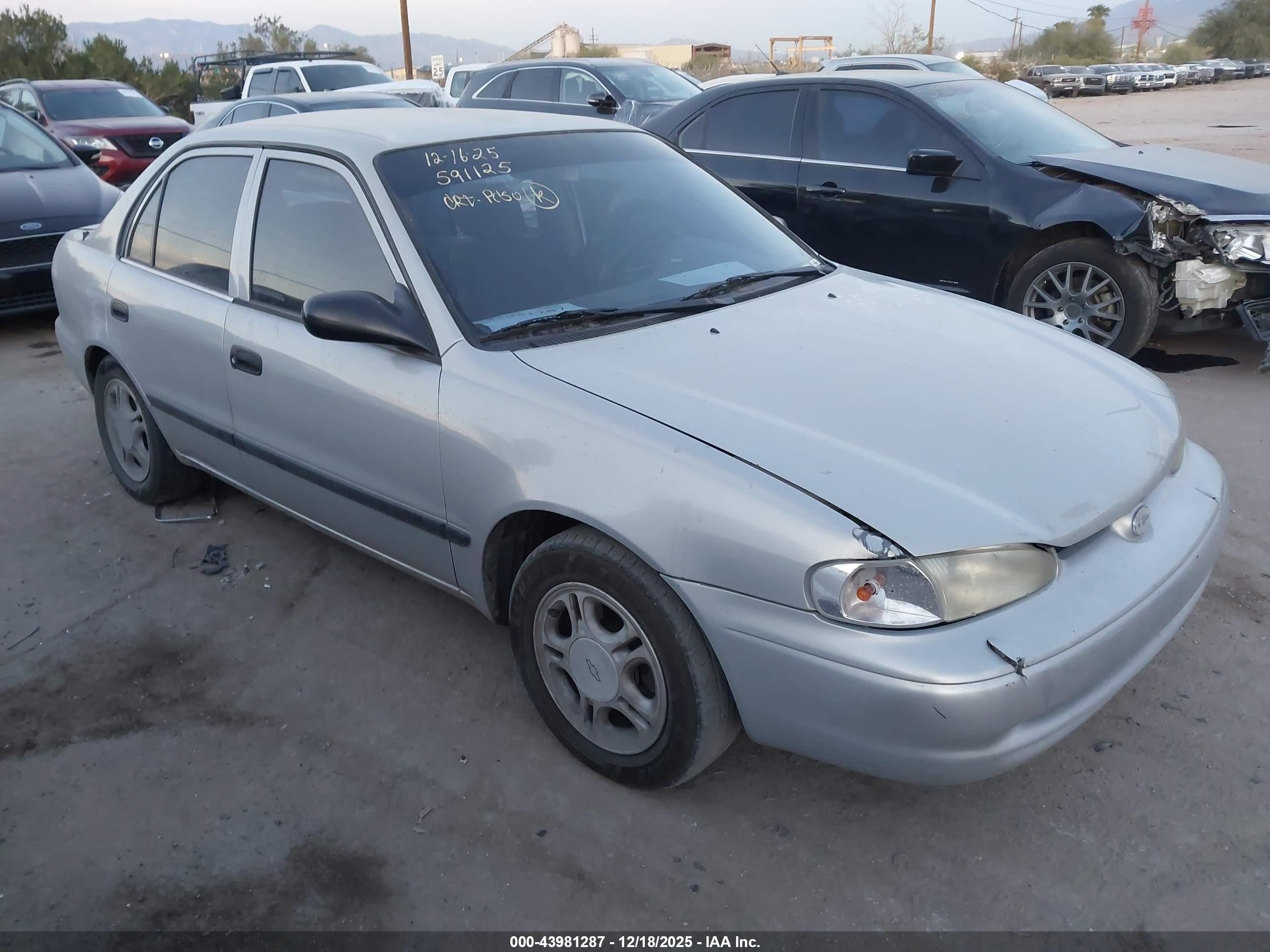 1999 Chevrolet Prizm, VIN 1Y1SK5288XZ425194 — Side