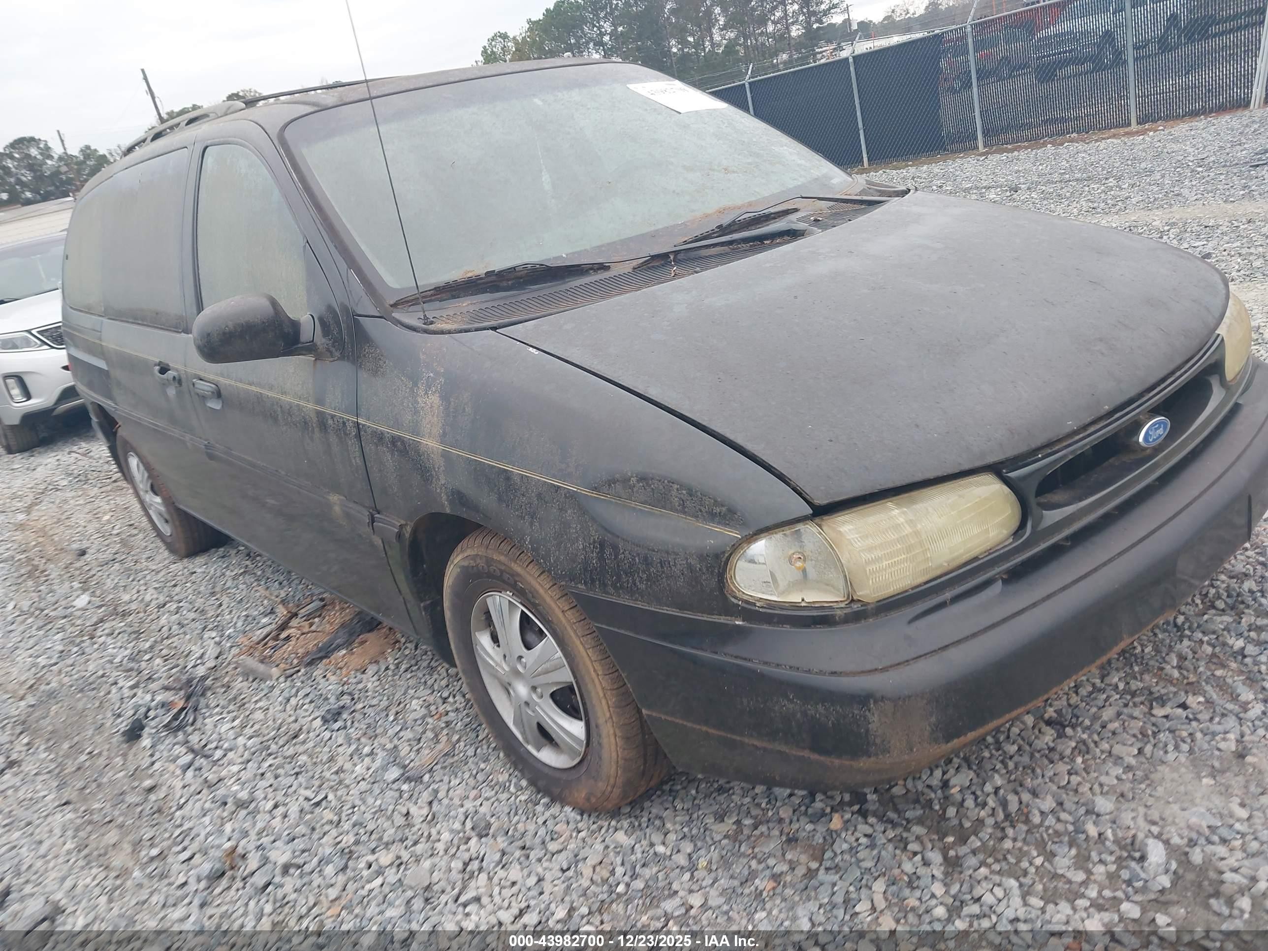 1995 Ford Windstar GL, VIN 2FMDA5142SBC59633 — Side