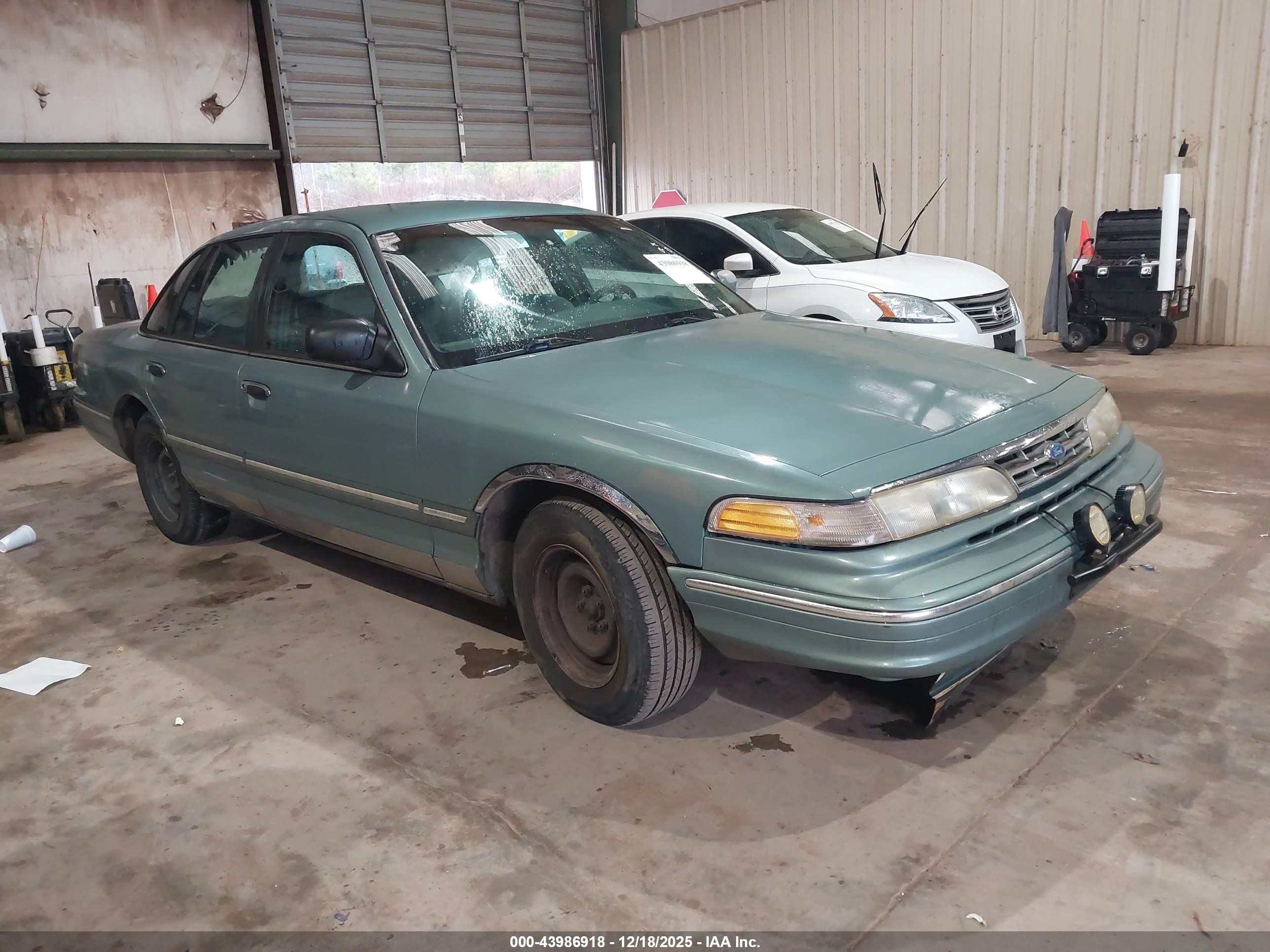 1997 Ford Crown Victoria, VIN 2FALP73W0VX138170 — Normal wear
