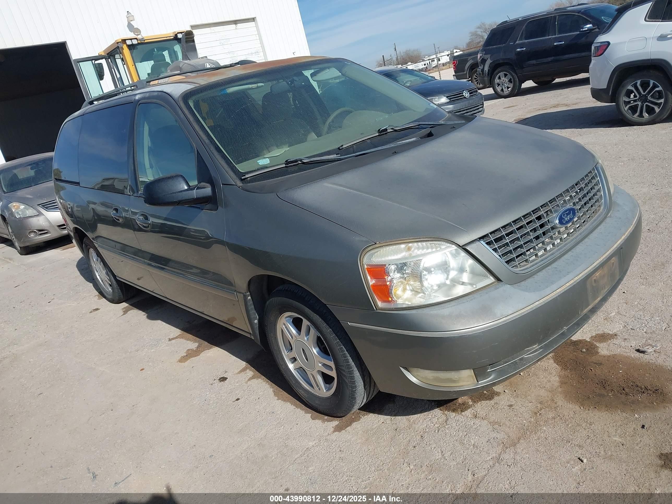 2006 Ford Freestar SEL, VIN 2FMZA522X6BA52058 — Side