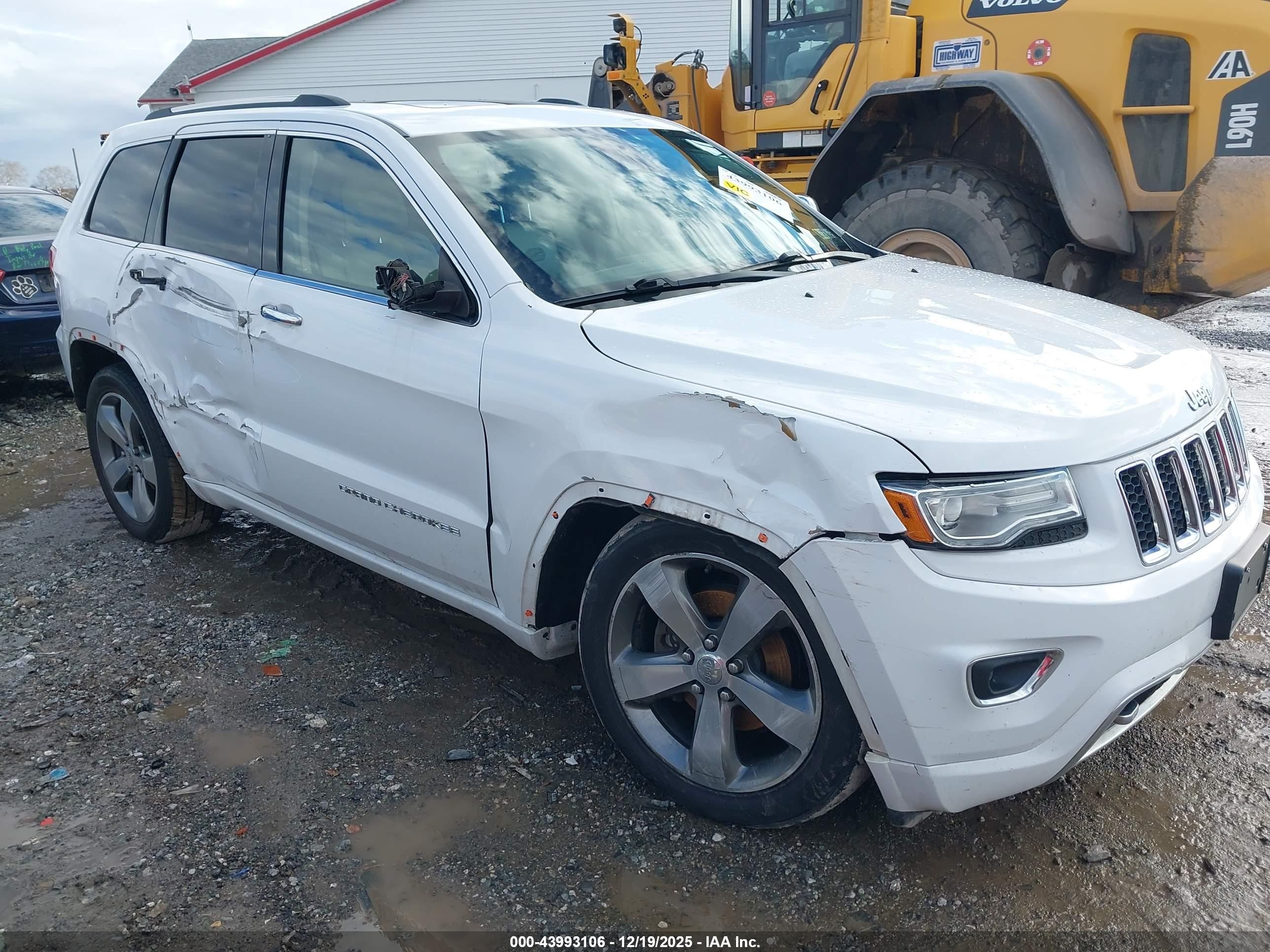 2014 Jeep Grand Cherokee Overland, VIN 1C4RJFCG5EC382161 — Бок