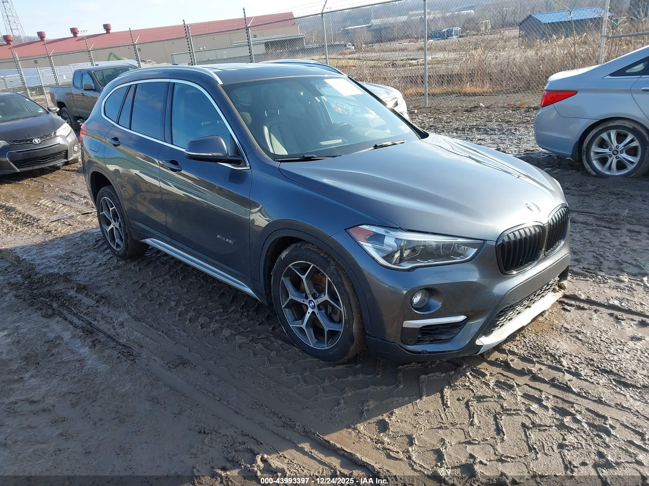 2018 BMW X1 xDrive28i, VIN WBXHT3C31J5F91161 — Undercarriage