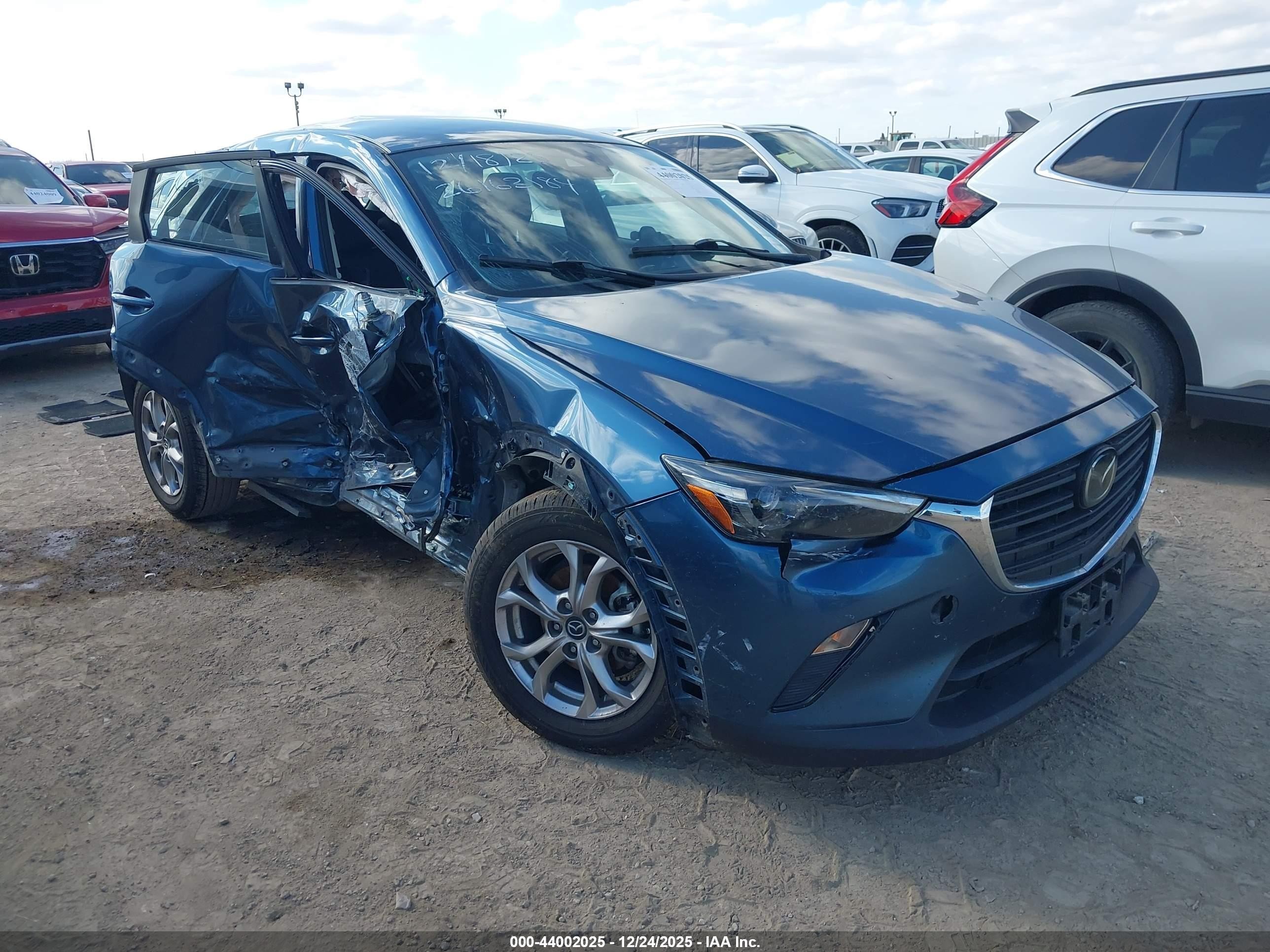 2019 Mazda CX-3 Sport, VIN JM1DKDB77K1449783 — Side